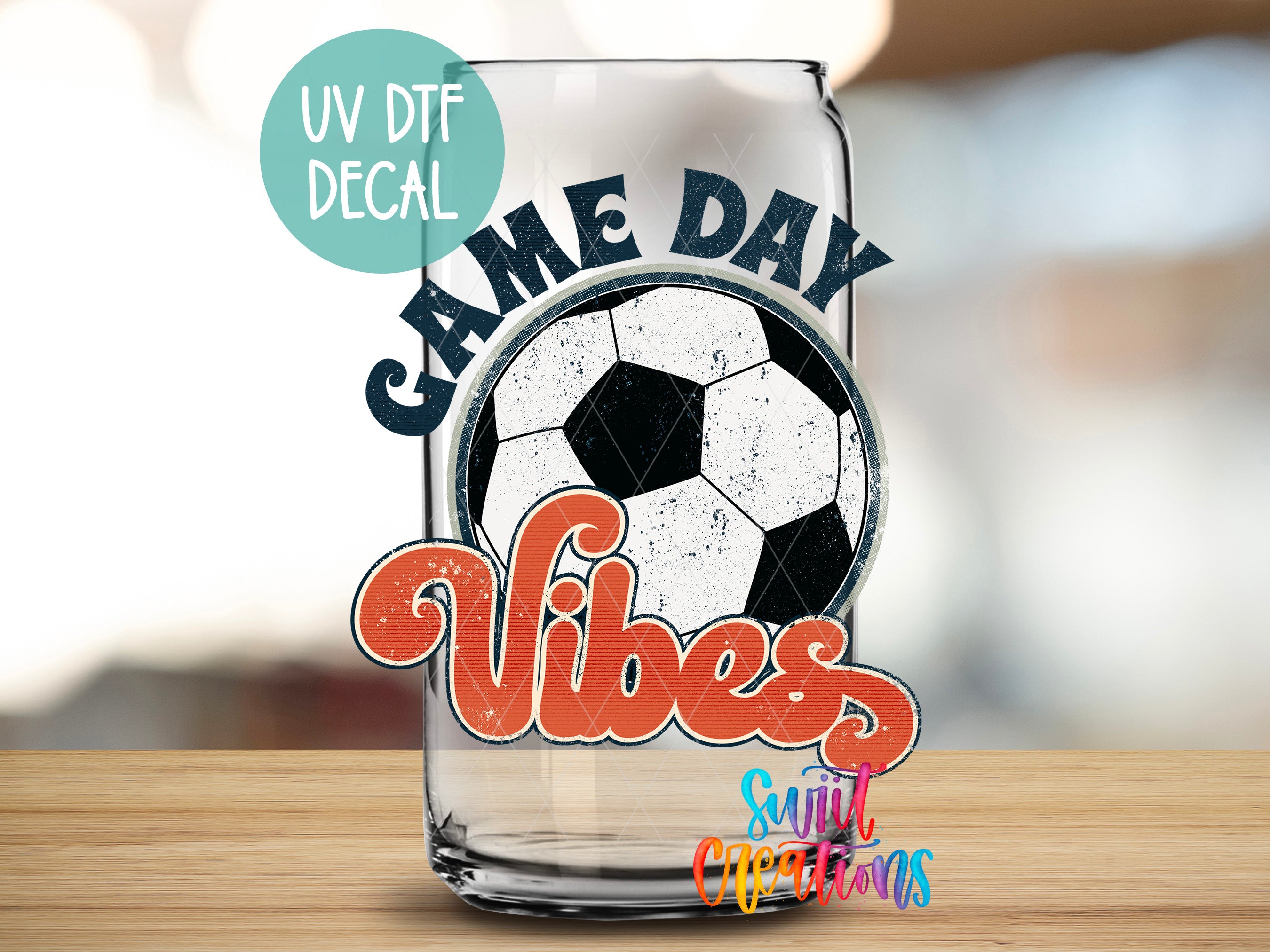 a glass with a soccer ball inside of it