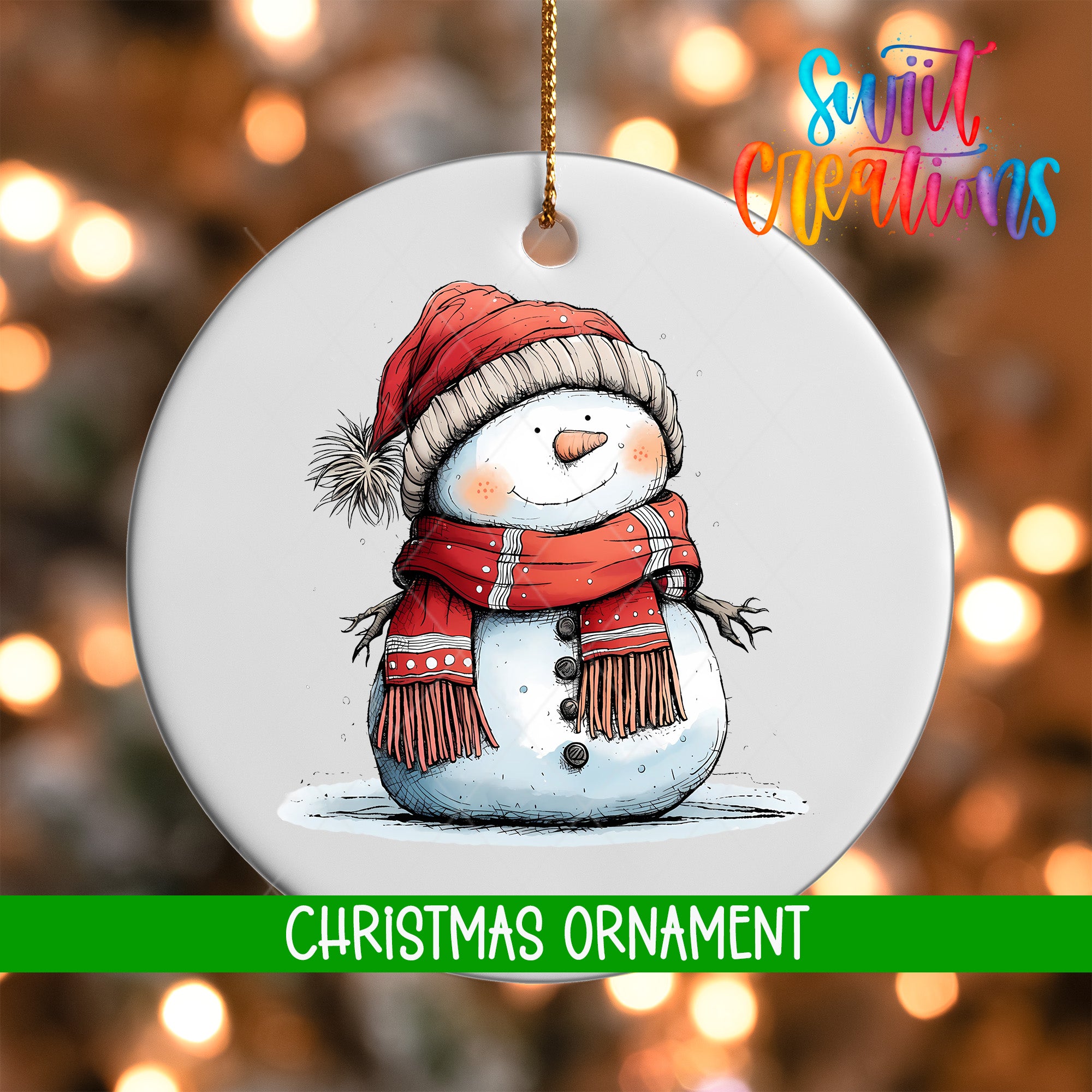 A white Christmas ornament featuring a snowman wearing a red scarf and hat, with a green ribbon around its neck.