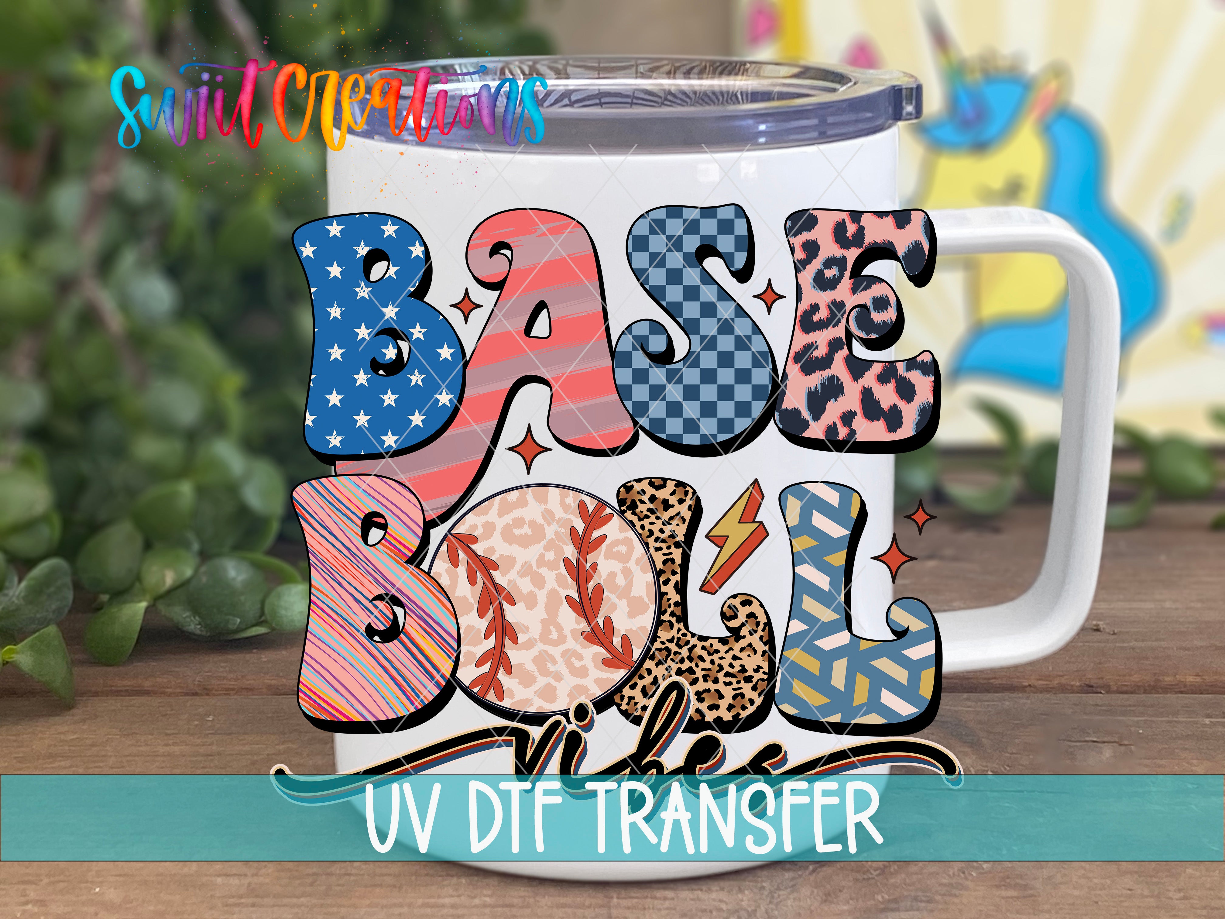 A white mug with colorful text that says "BASE BALL VU DFT TRANSFER" printed on it.