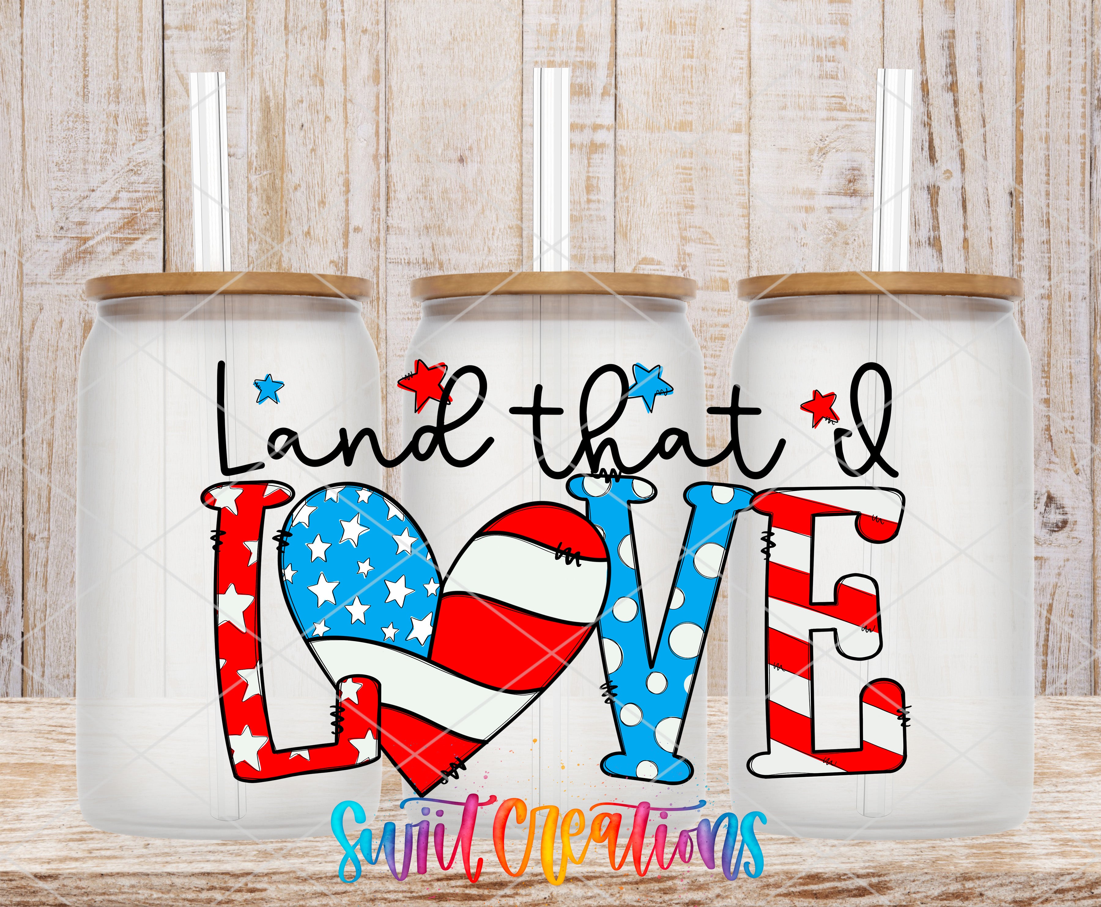 three glass tumblers with the text "Land that I Love" printed on them.