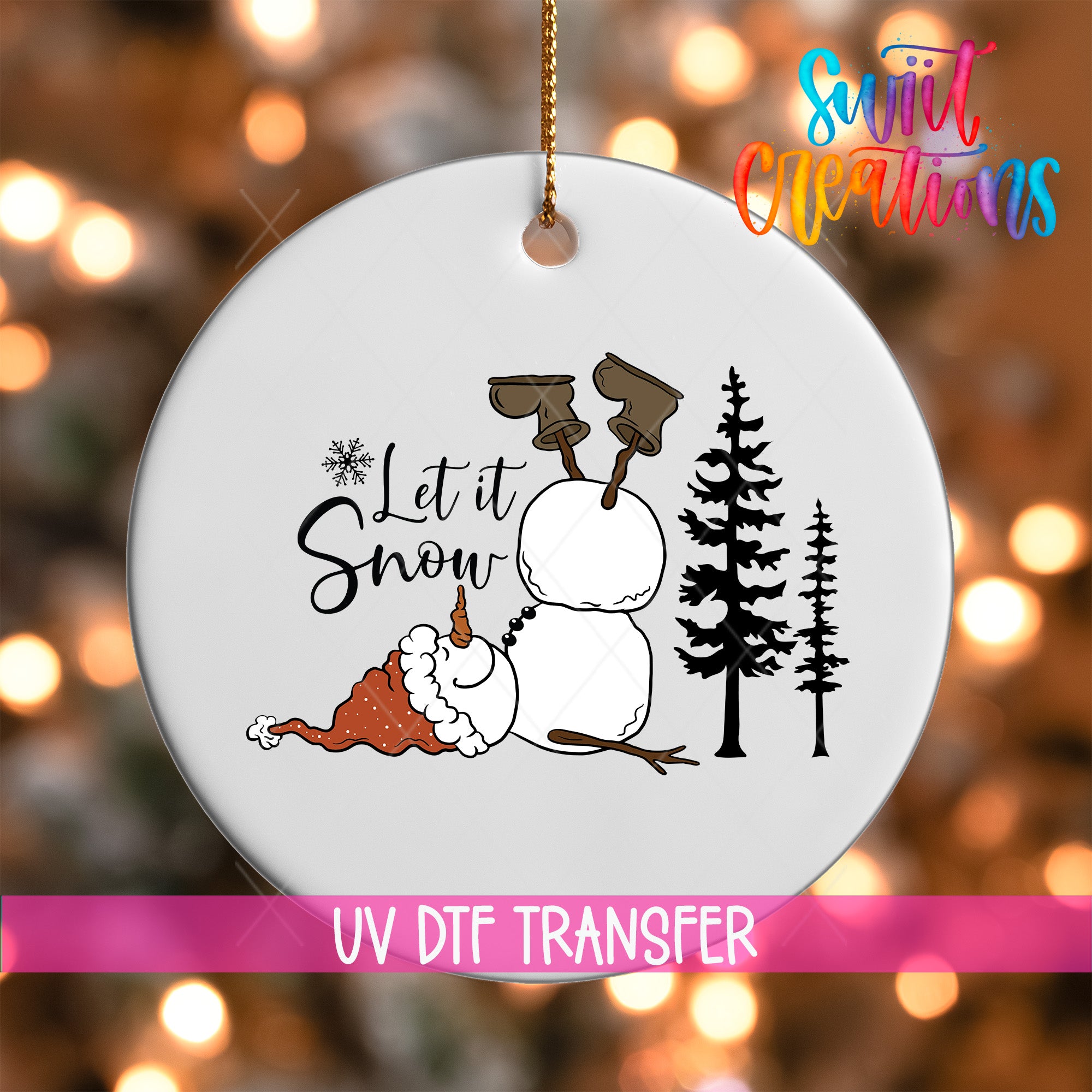 A white ornament with a snowman and trees, along with the text "Let it Snow" and a snowflake design.