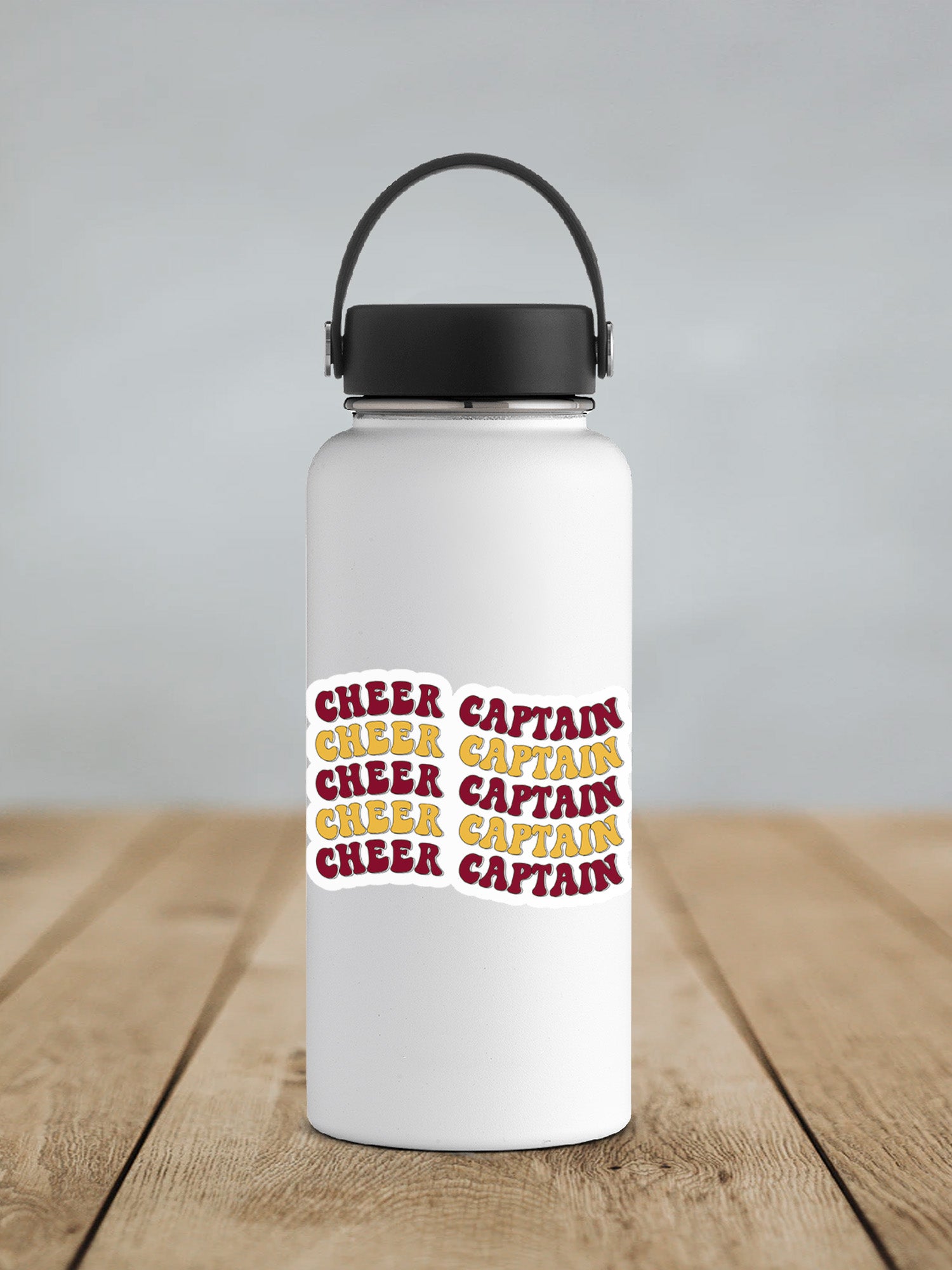 a white water bottle sitting on top of a wooden table