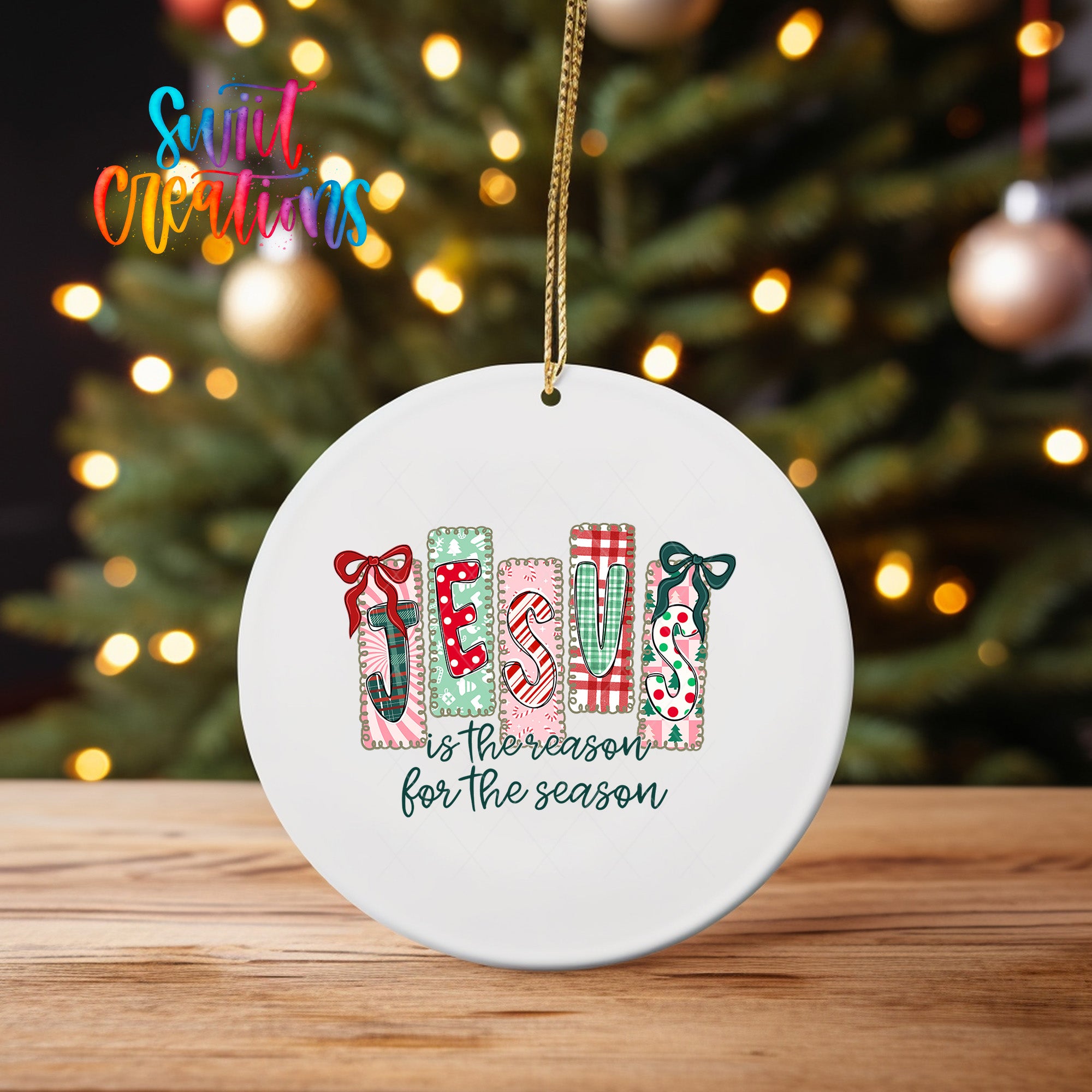 A white ceramic ornament with a Christmas tree in the background.