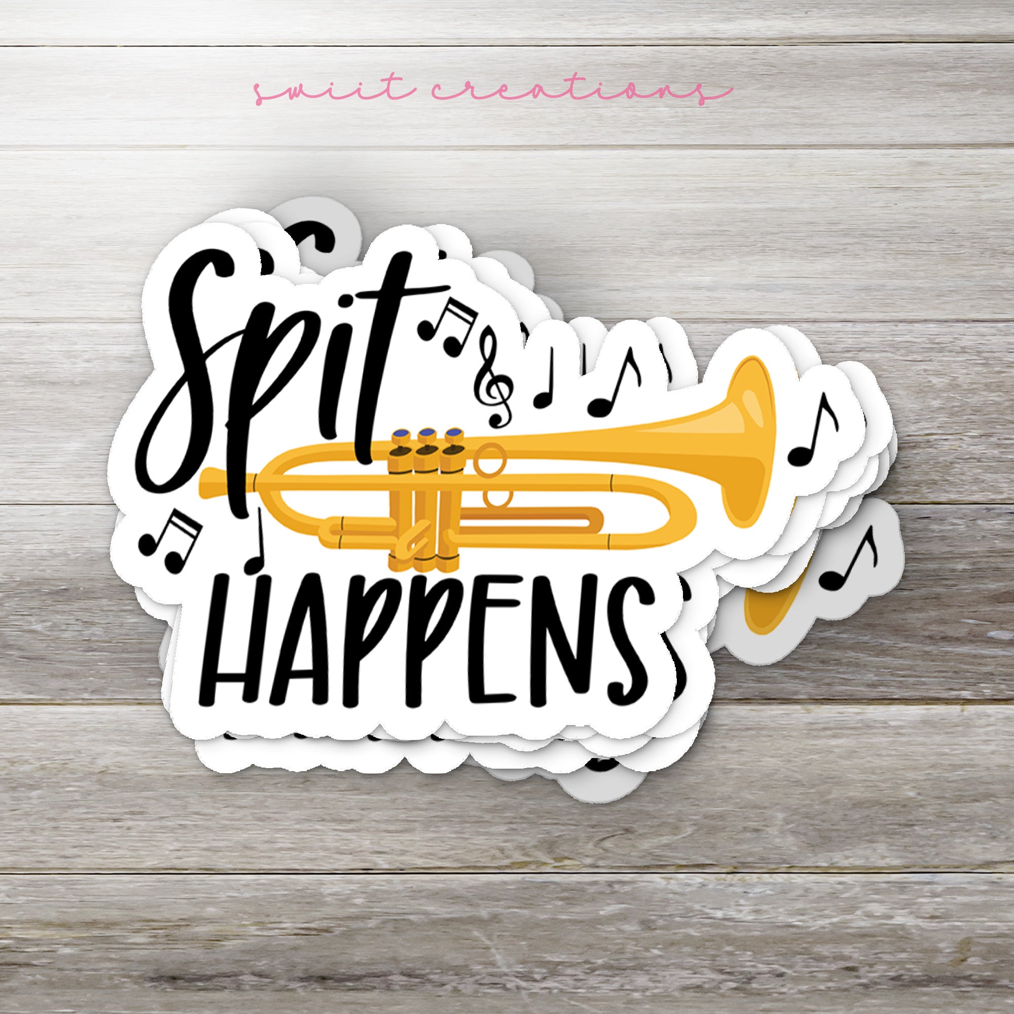 a sticker that says spit happens with a trumpet