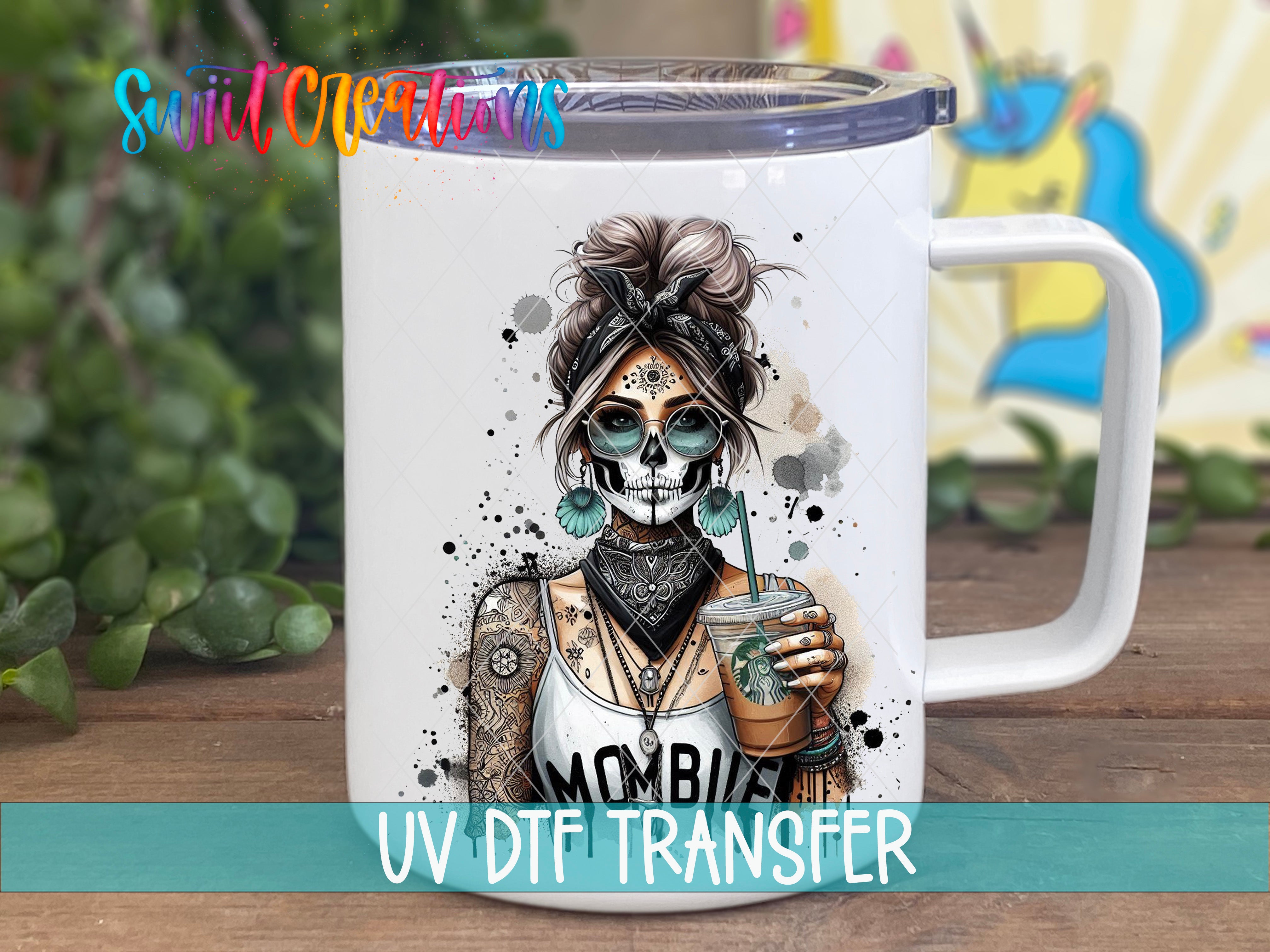 A white mug with a colorful illustration of a woman with a skull design and a Starbucks cup on it.