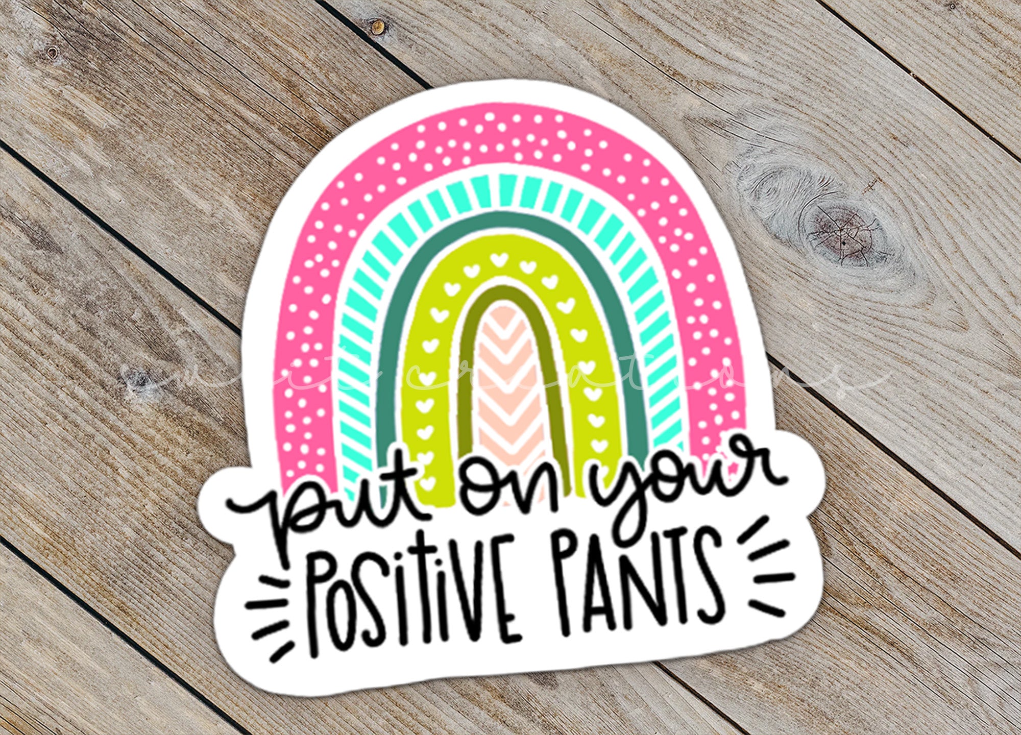a sticker that says put on your positive pants