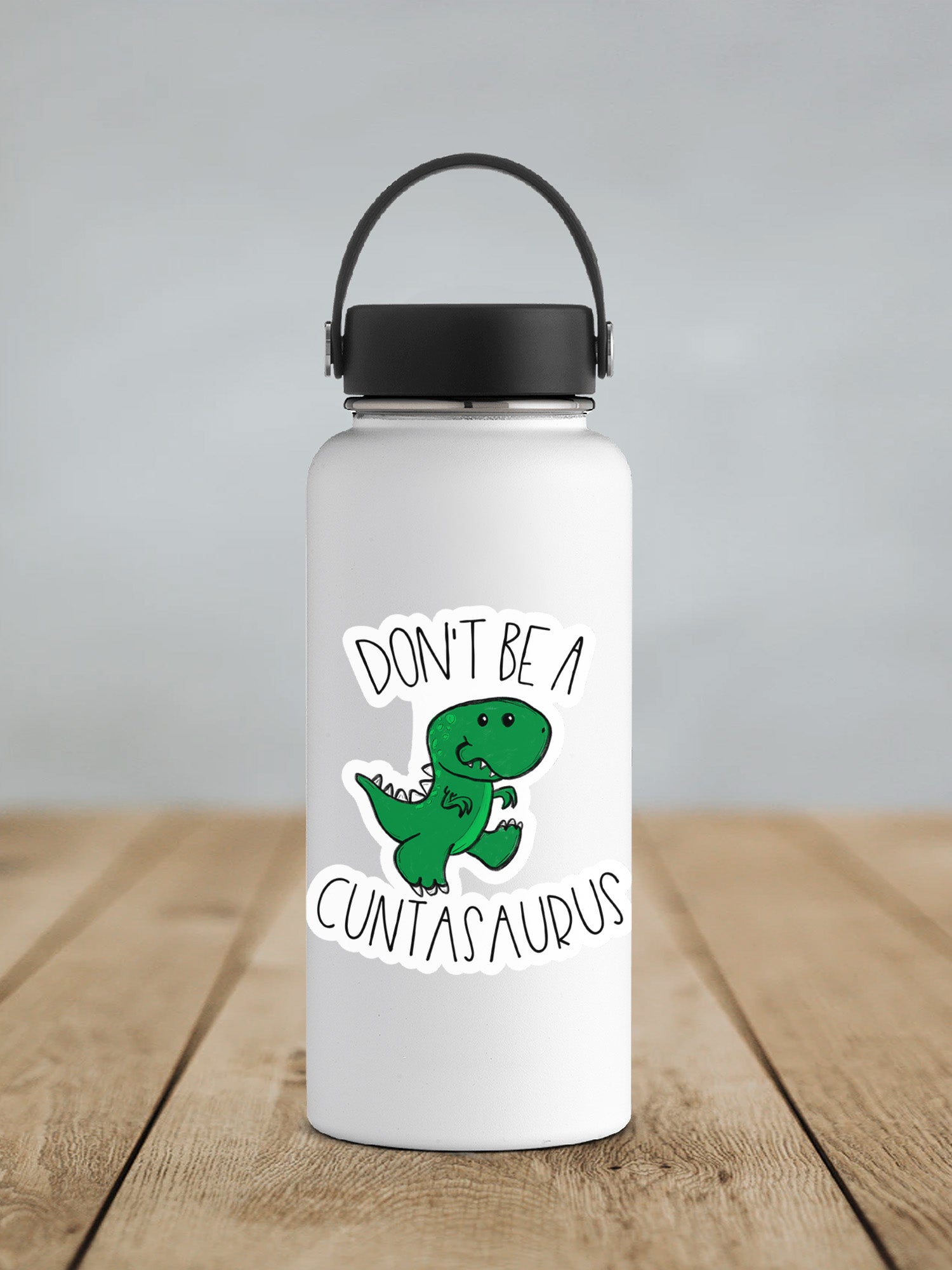 a white water bottle with a black lid that says, don't be a