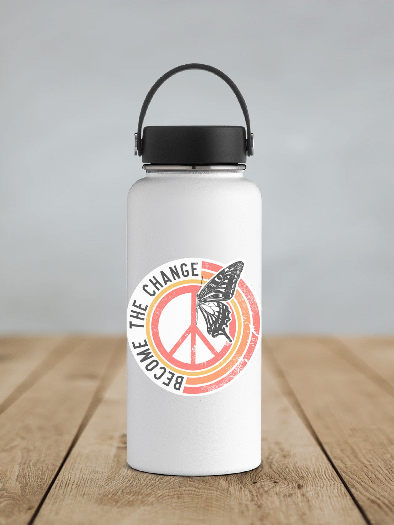 a white water bottle with a peace sign on it