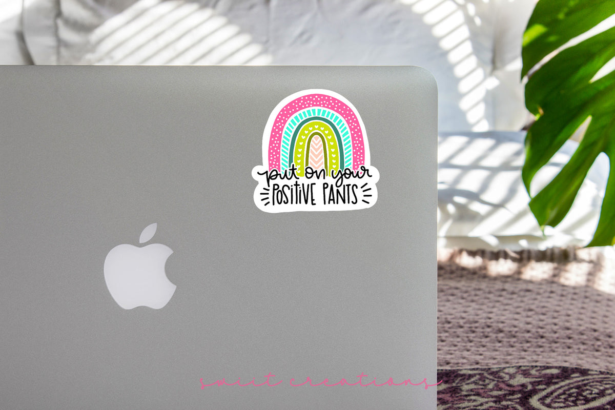 a laptop computer with a sticker on it