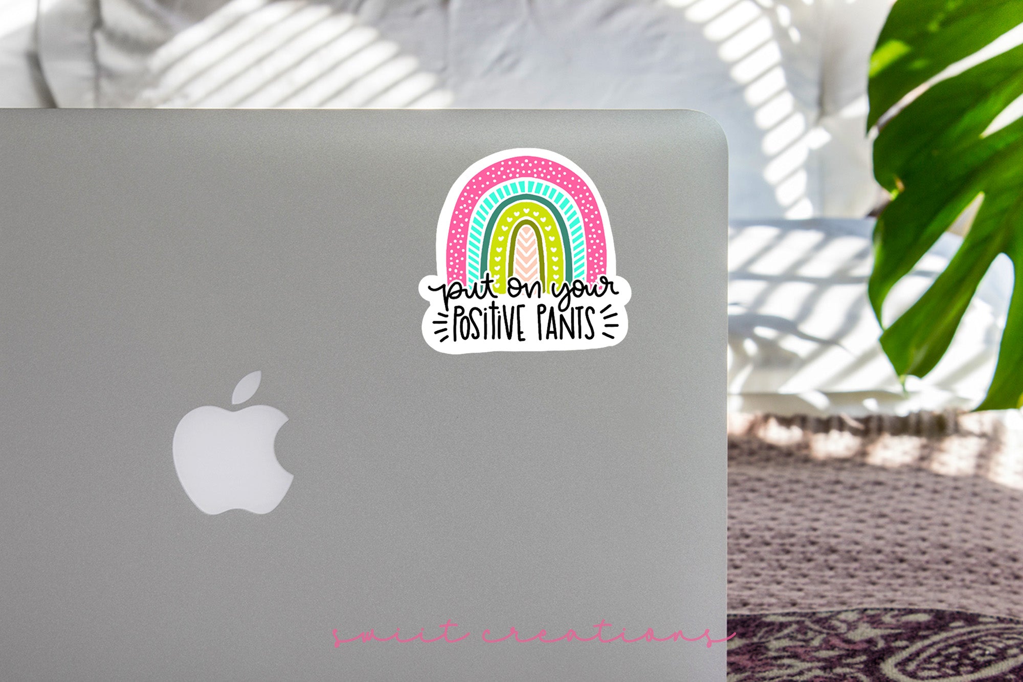 a laptop computer with a sticker on it