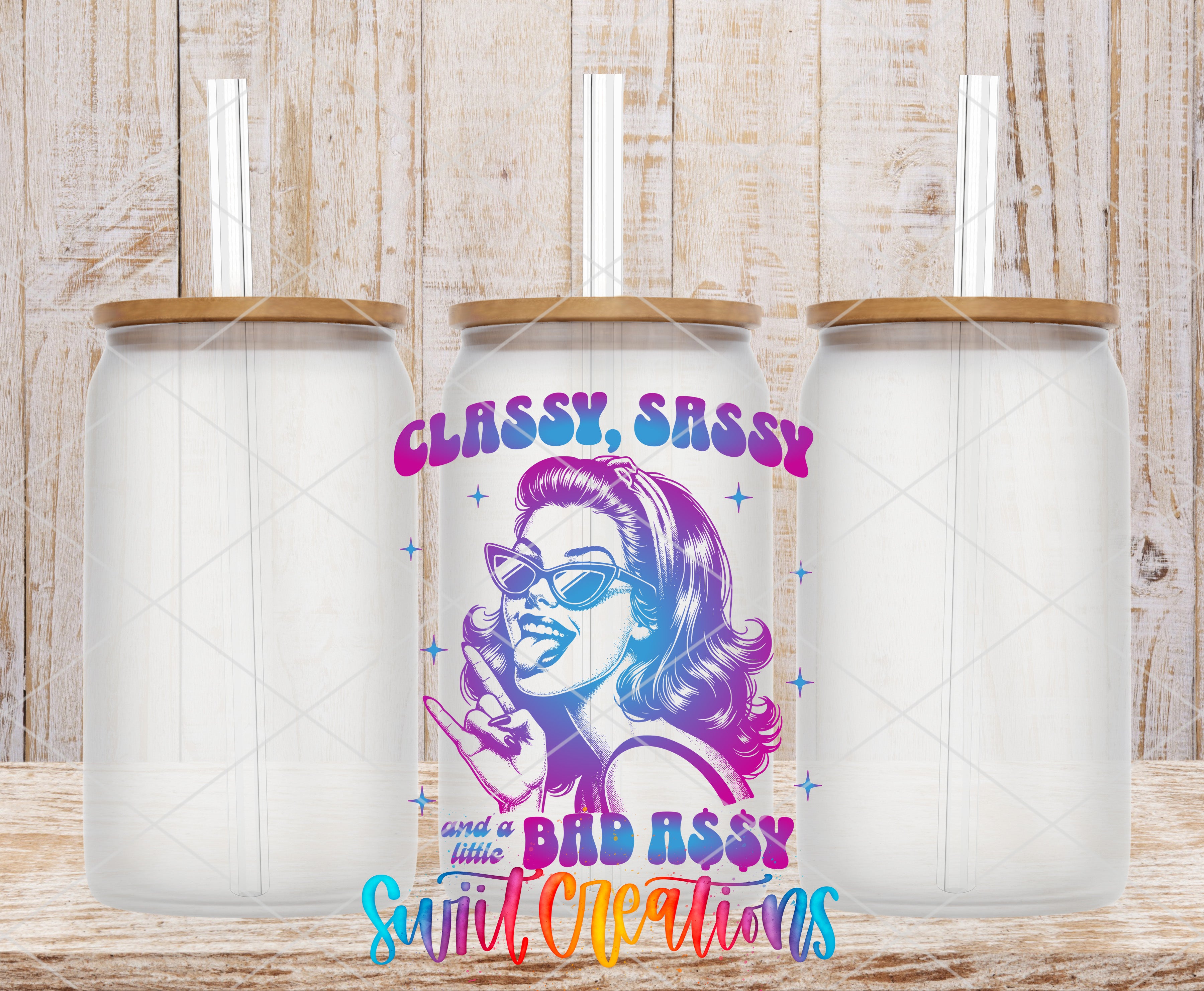 a colorful can with a woman's face and the text "CLASSY, SASSY and a little BAD ASSY" printed on it, placed on a wooden surface.