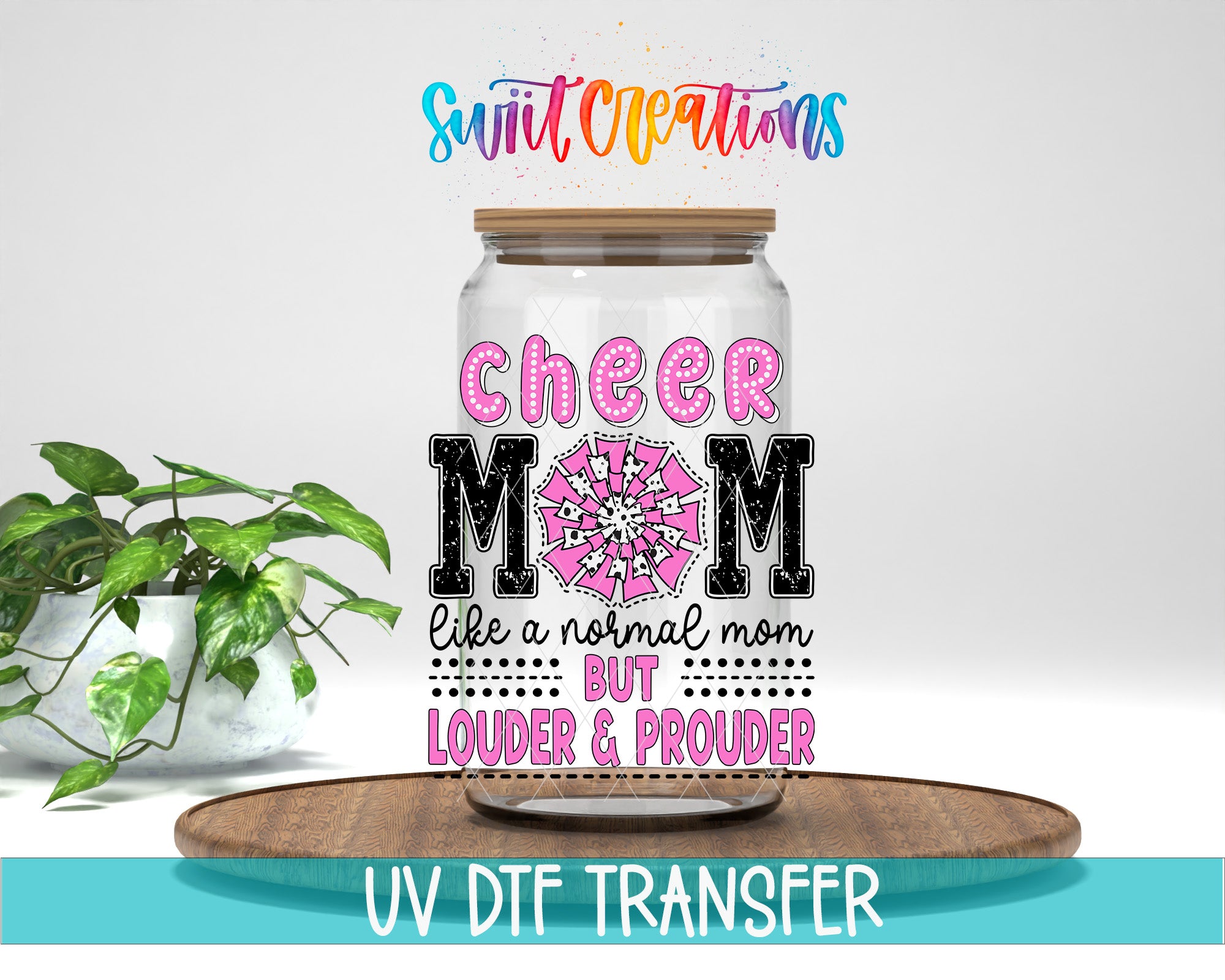 a glass jar with a printed design on it, placed on a wooden surface. The design includes text and graphics related to cheerleading and a mother figure.