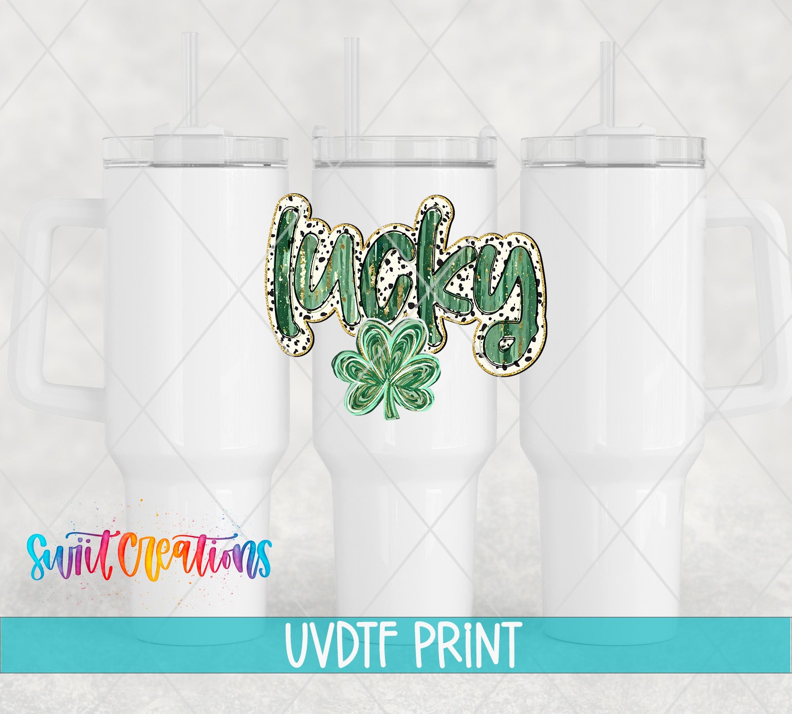 a white ceramic mug with a green and white design, including a clover and the word "lucky" written on it. The mug is placed against a light background, and there is text at the bottom of the image that reads "Swit Creations UVDF PRINT".