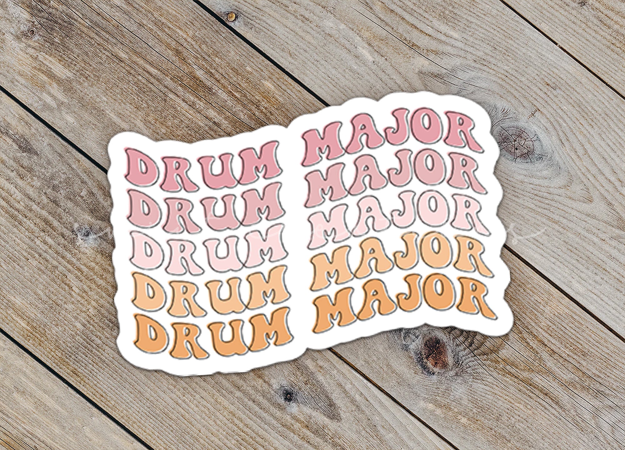 a sticker with the words drum major and drum major on it