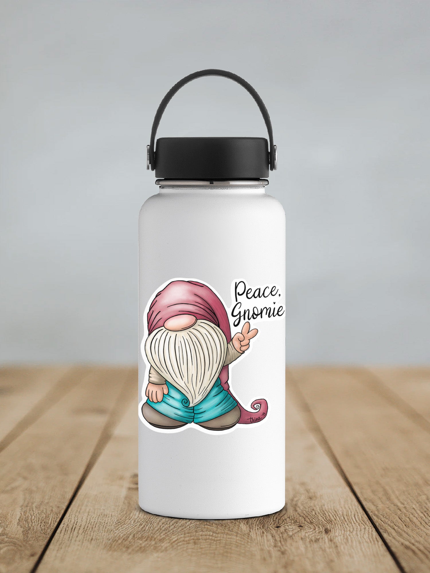 a water bottle with a picture of a gnome on it