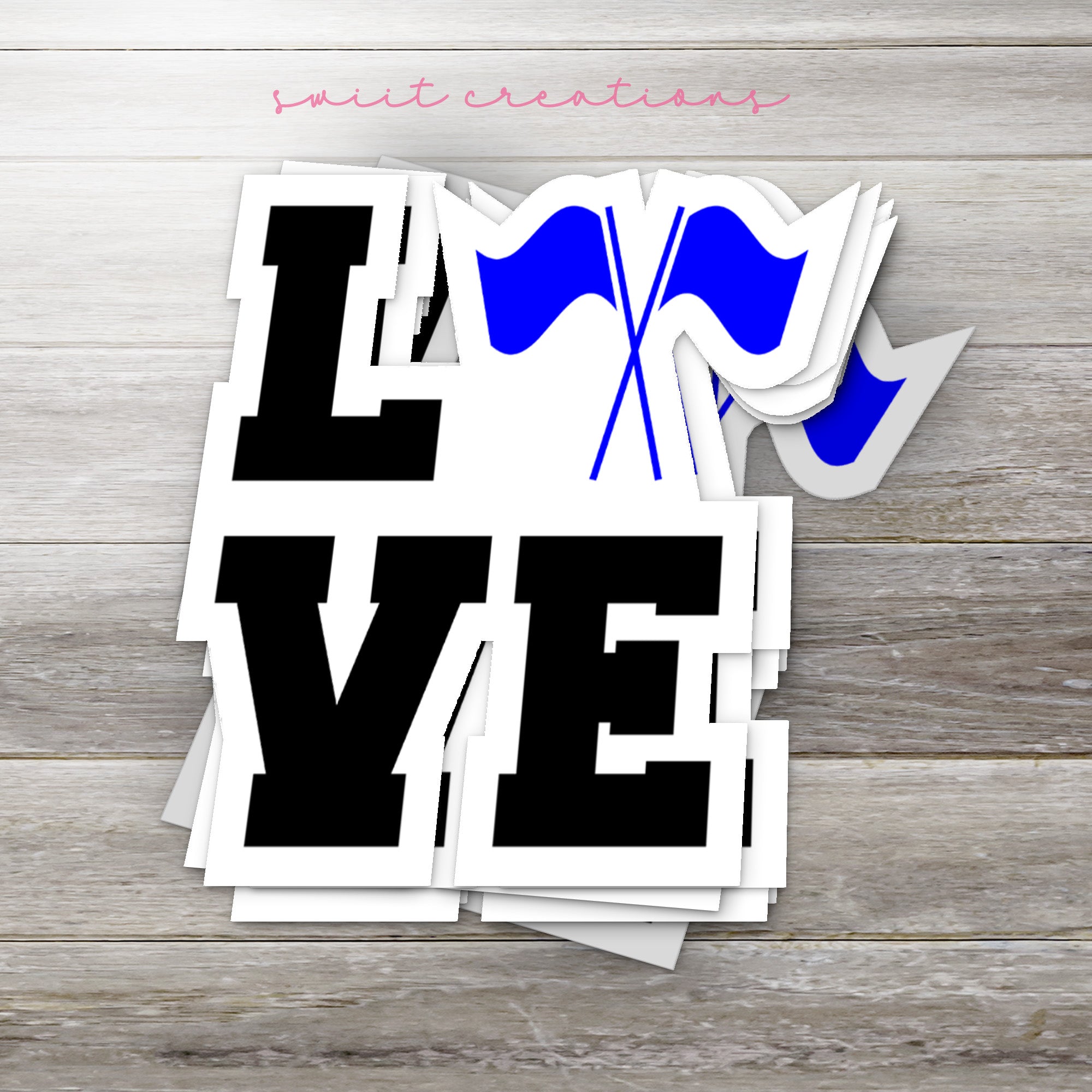 a bunch of stickers that are on a table