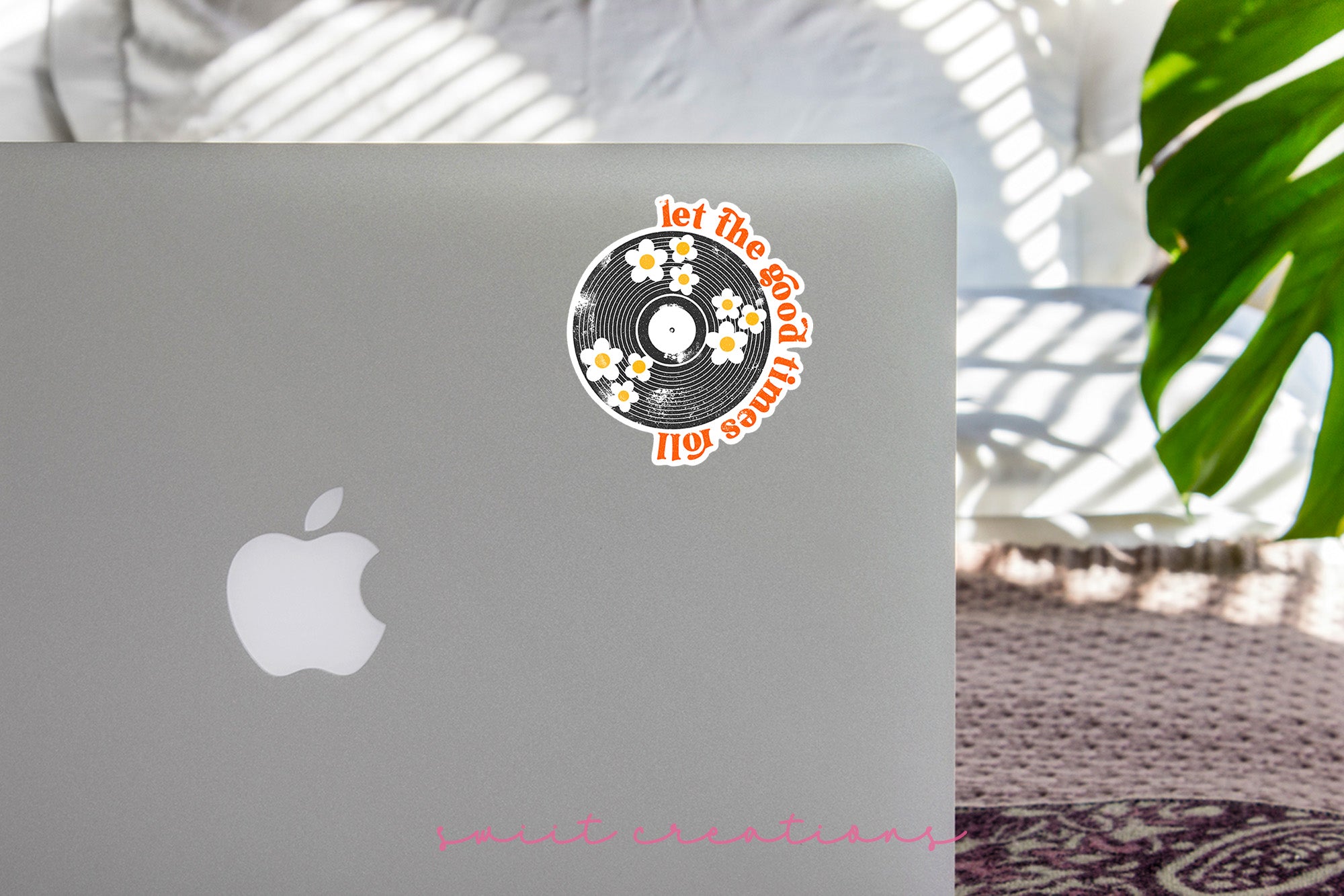 a laptop computer sitting on top of a table