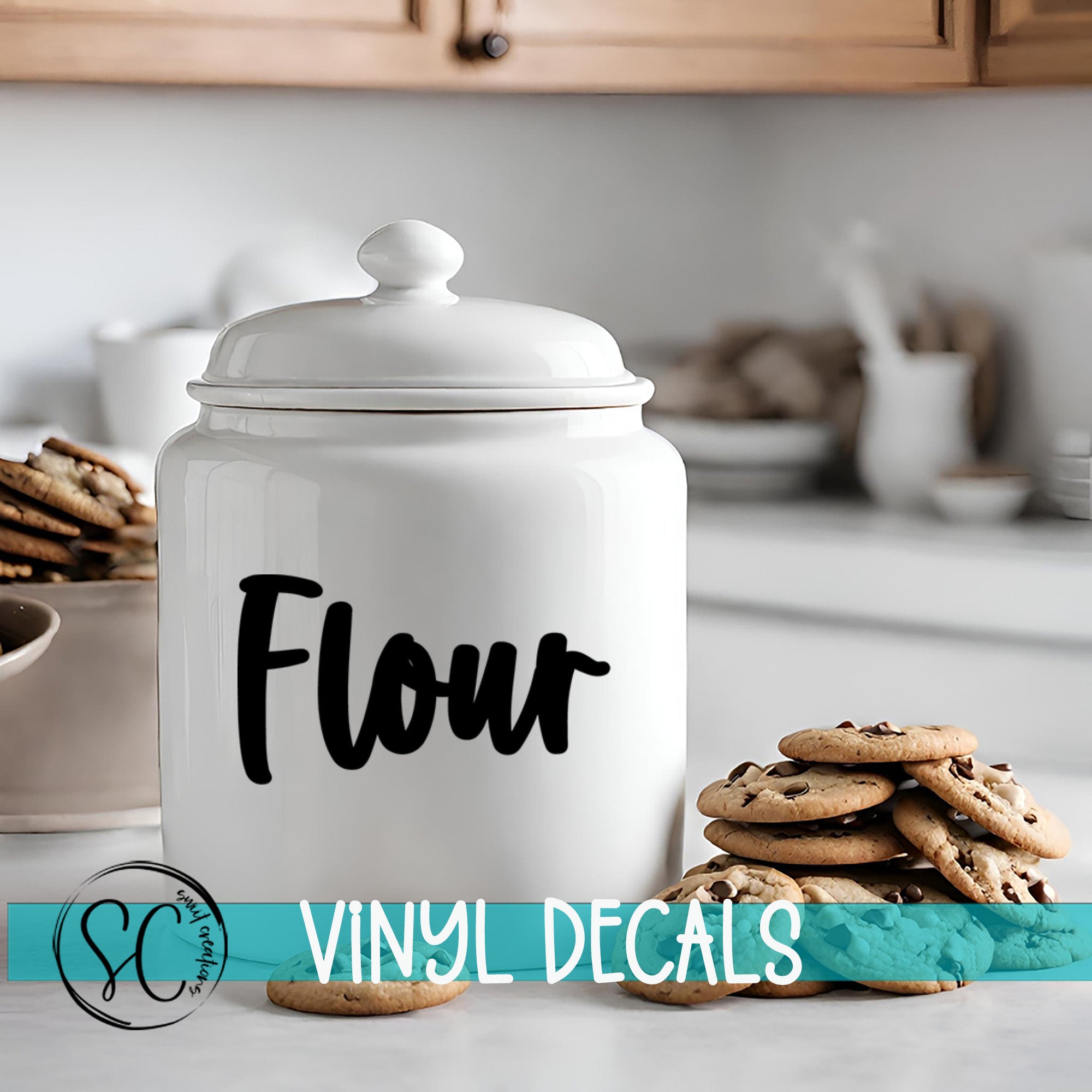 A white ceramic jar labeled "Flour" sits on a kitchen counter, surrounded by stacks of chocolate chip cookies.