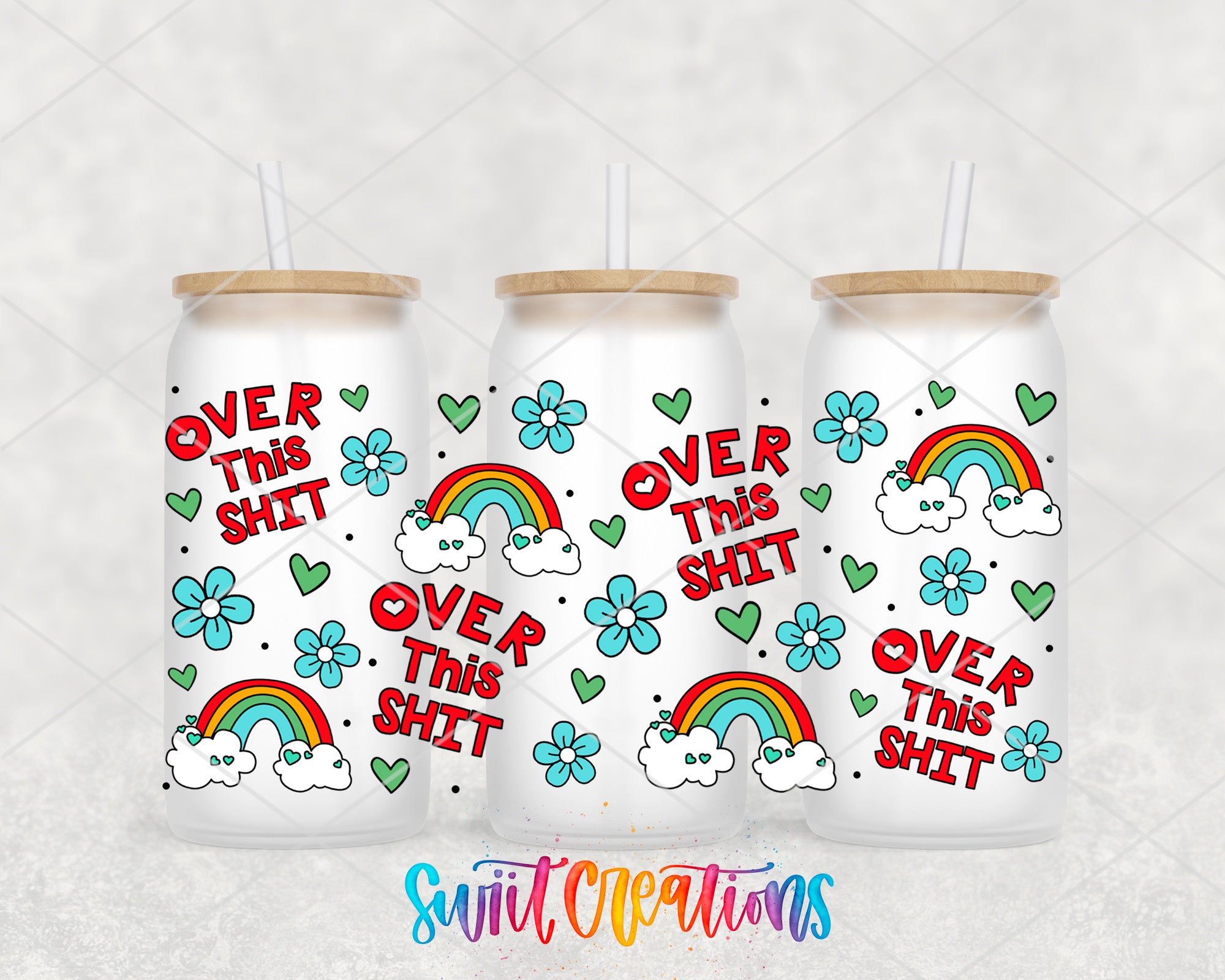 three white tumblers with colorful designs and text on them.