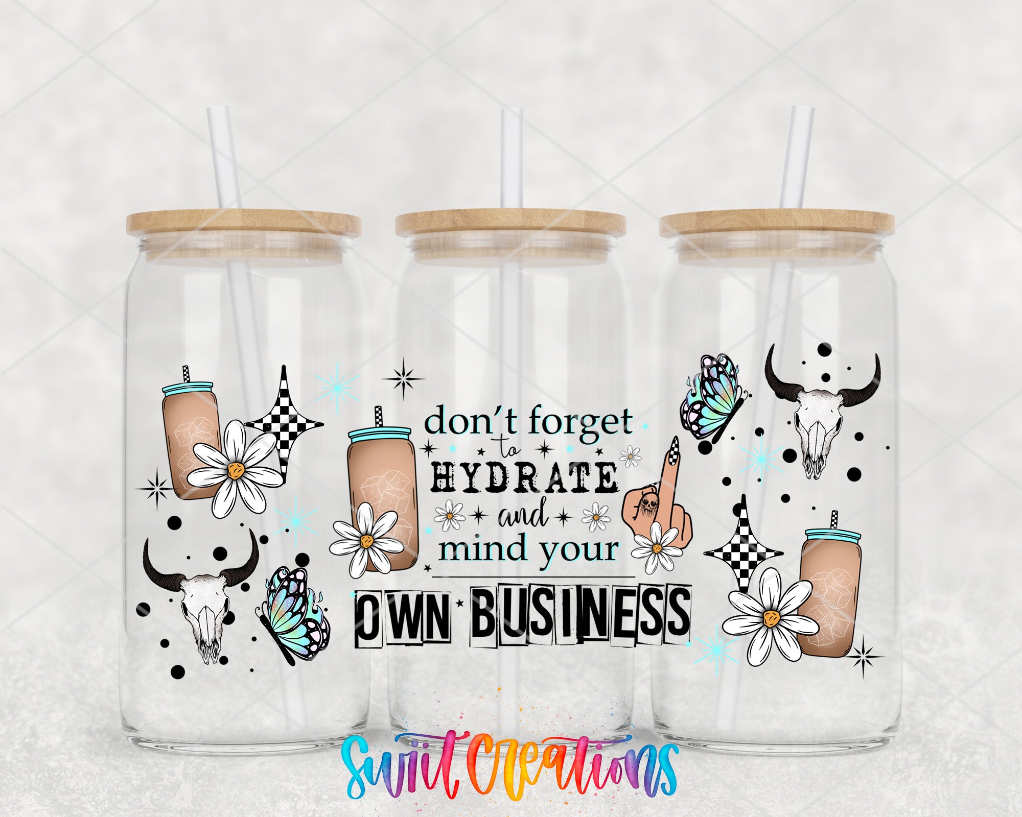 three glass tumblers with straws, each adorned with a unique design and text. The text on the tumblers reads "don't forget to hydrate and think your own business".