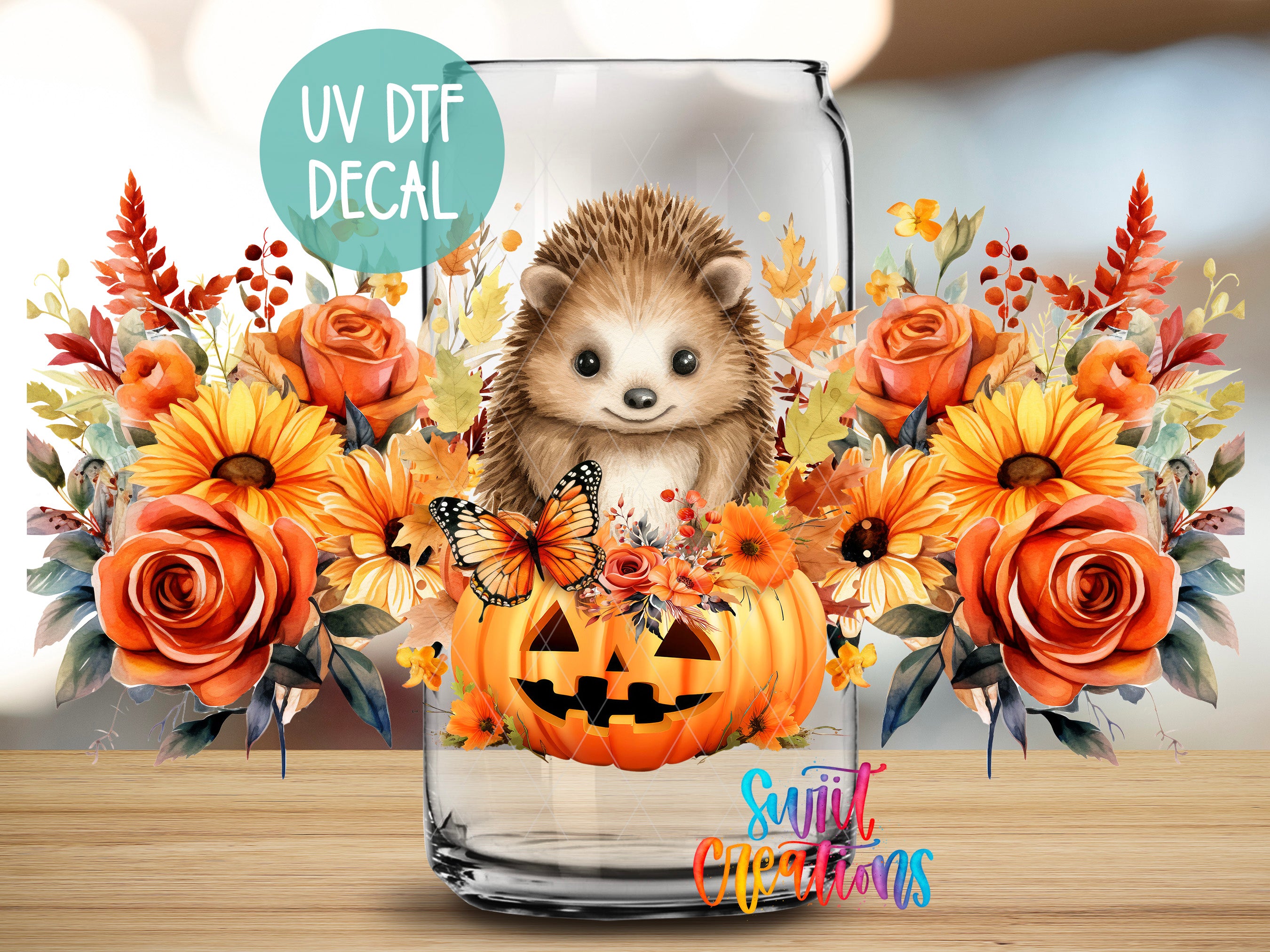 A glass jar filled with a pumpkin and flowers, featuring a hedgehog and butterflies, with a UV decal on the jar.