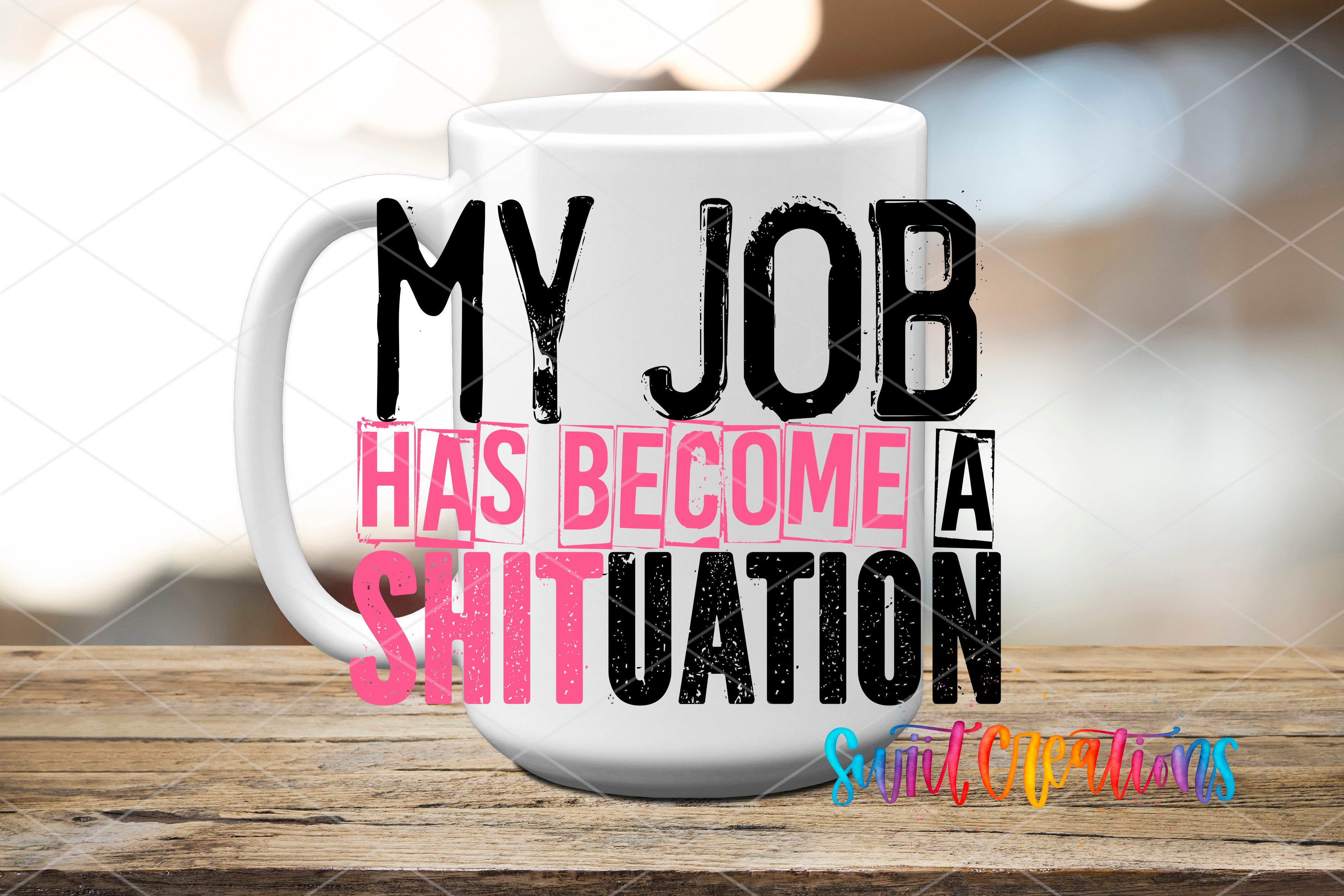 A white mug with text on it, placed on a wooden surface.