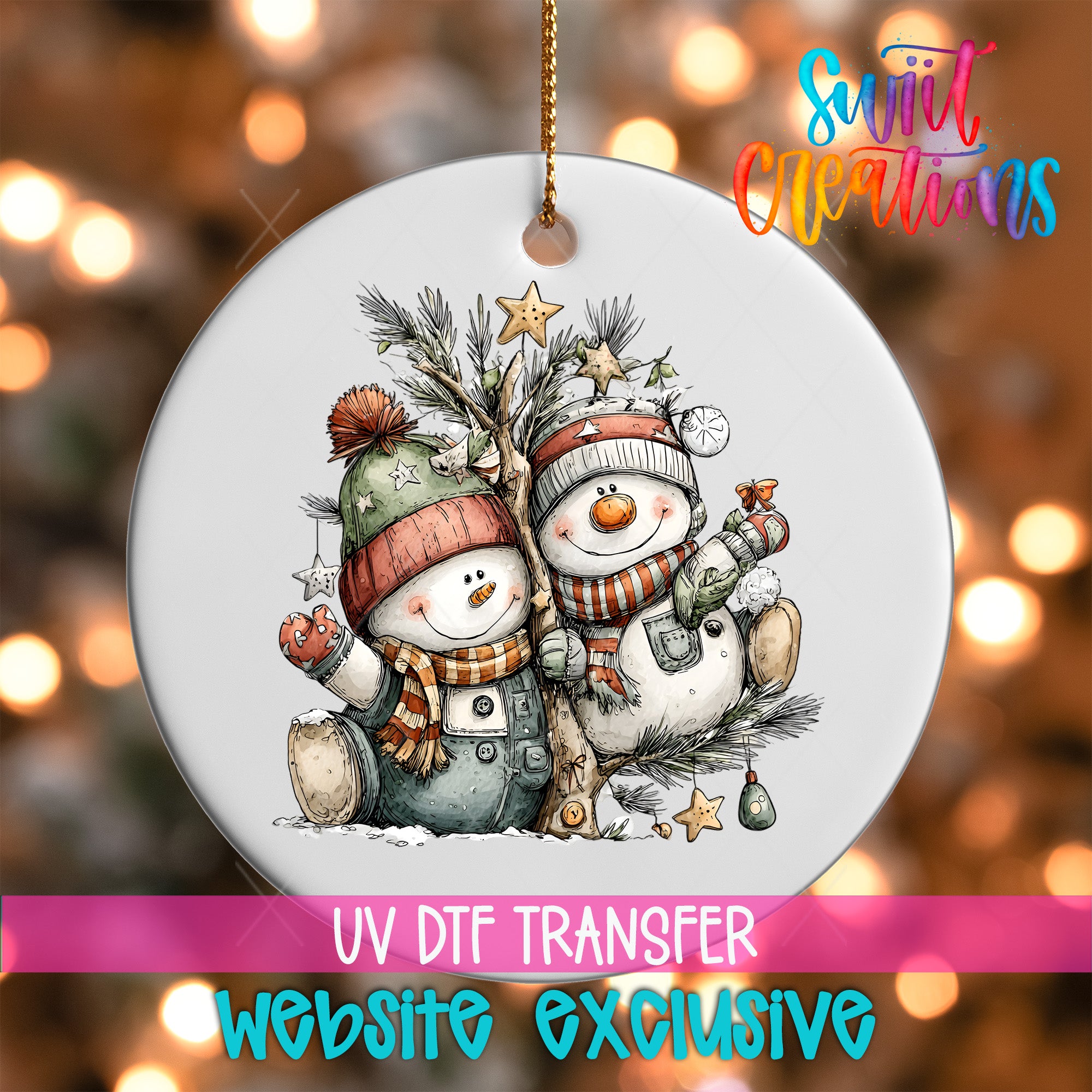 A white ornament with a snowman and star on a Christmas tree, along with a text overlay that reads "UV DFT Transfer Website exclusive".
