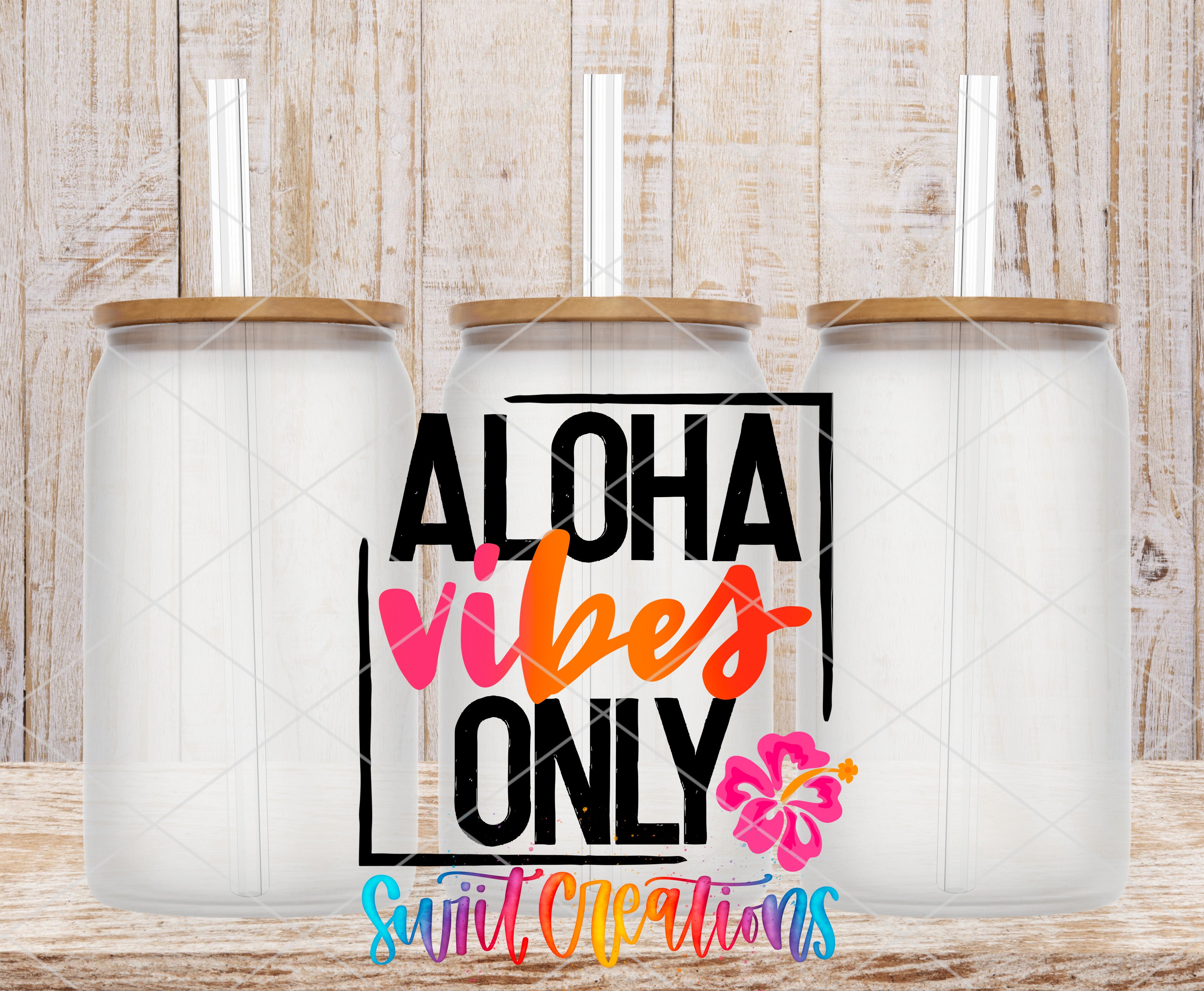 three clear glass jars with wooden lids, arranged in a row against a wooden background. The jars have straws attached to their lids. The text "ALOHAS VIBES ONLY" is displayed prominently in the center of the image, with a small pink flower in the bottom right corner.