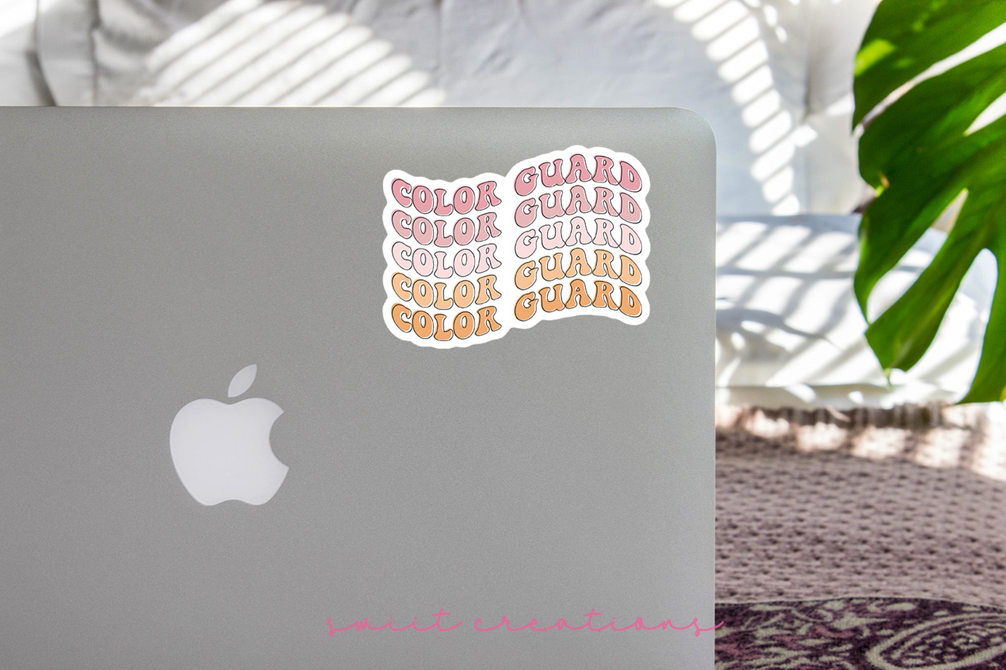 a laptop with a sticker on it sitting on a table