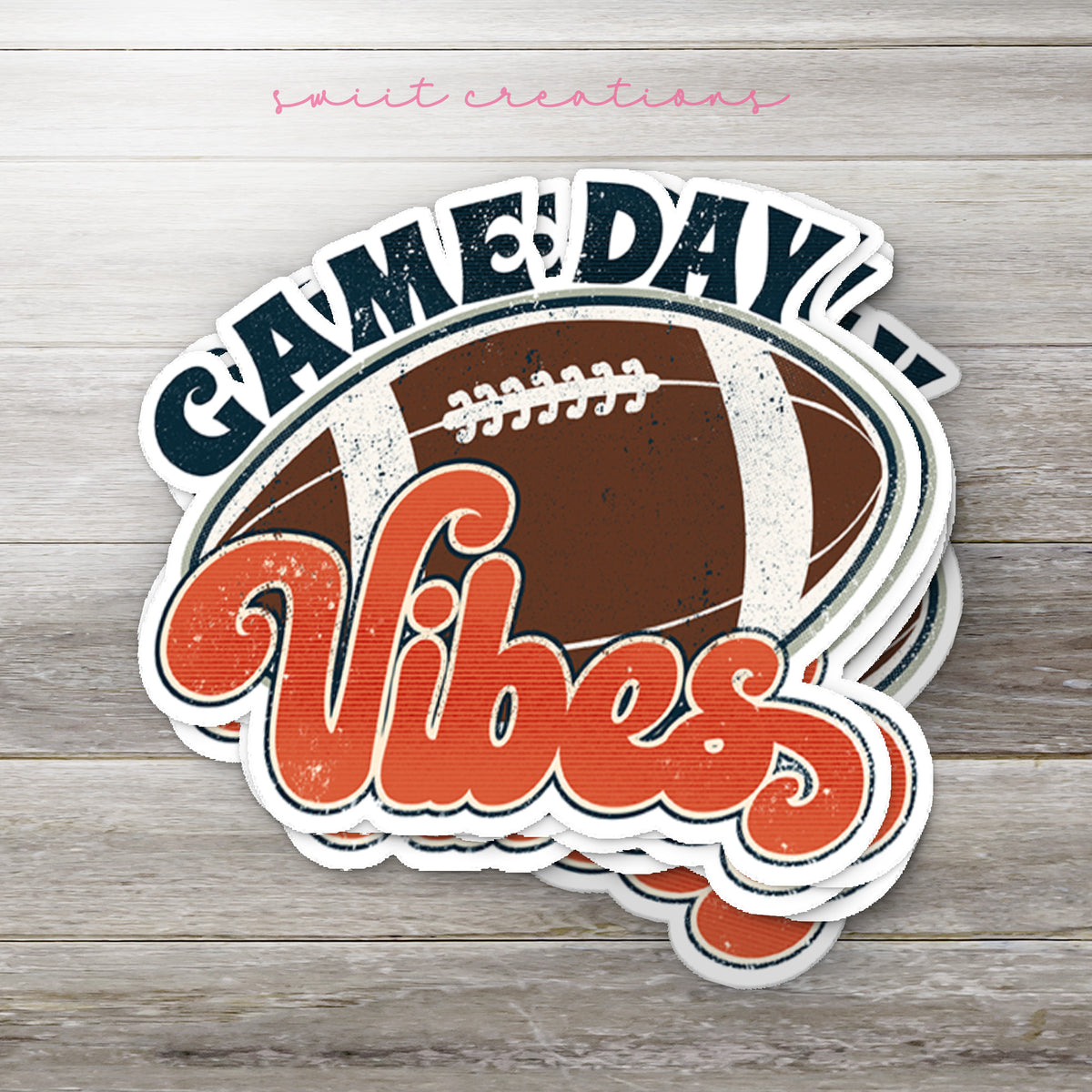 a sticker that says game day vibes with a football on it