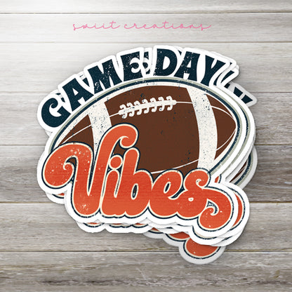 a sticker that says game day vibes with a football on it