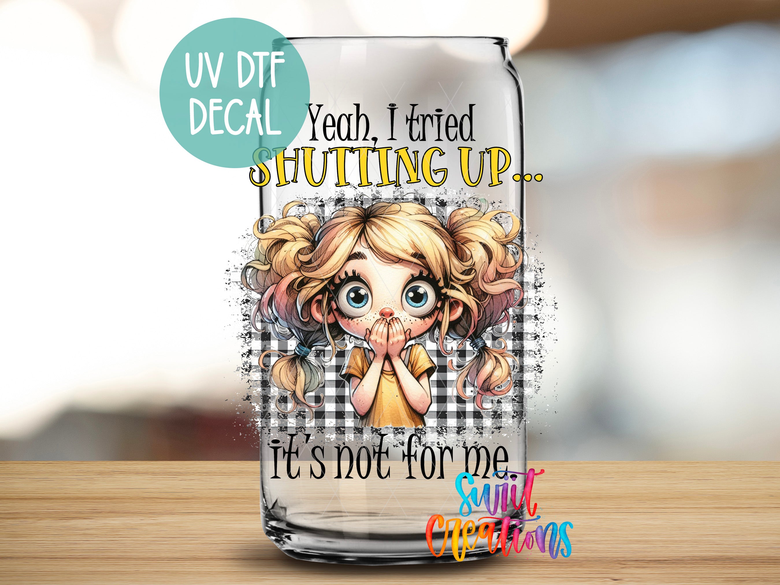 a glass with a picture of a girl on it