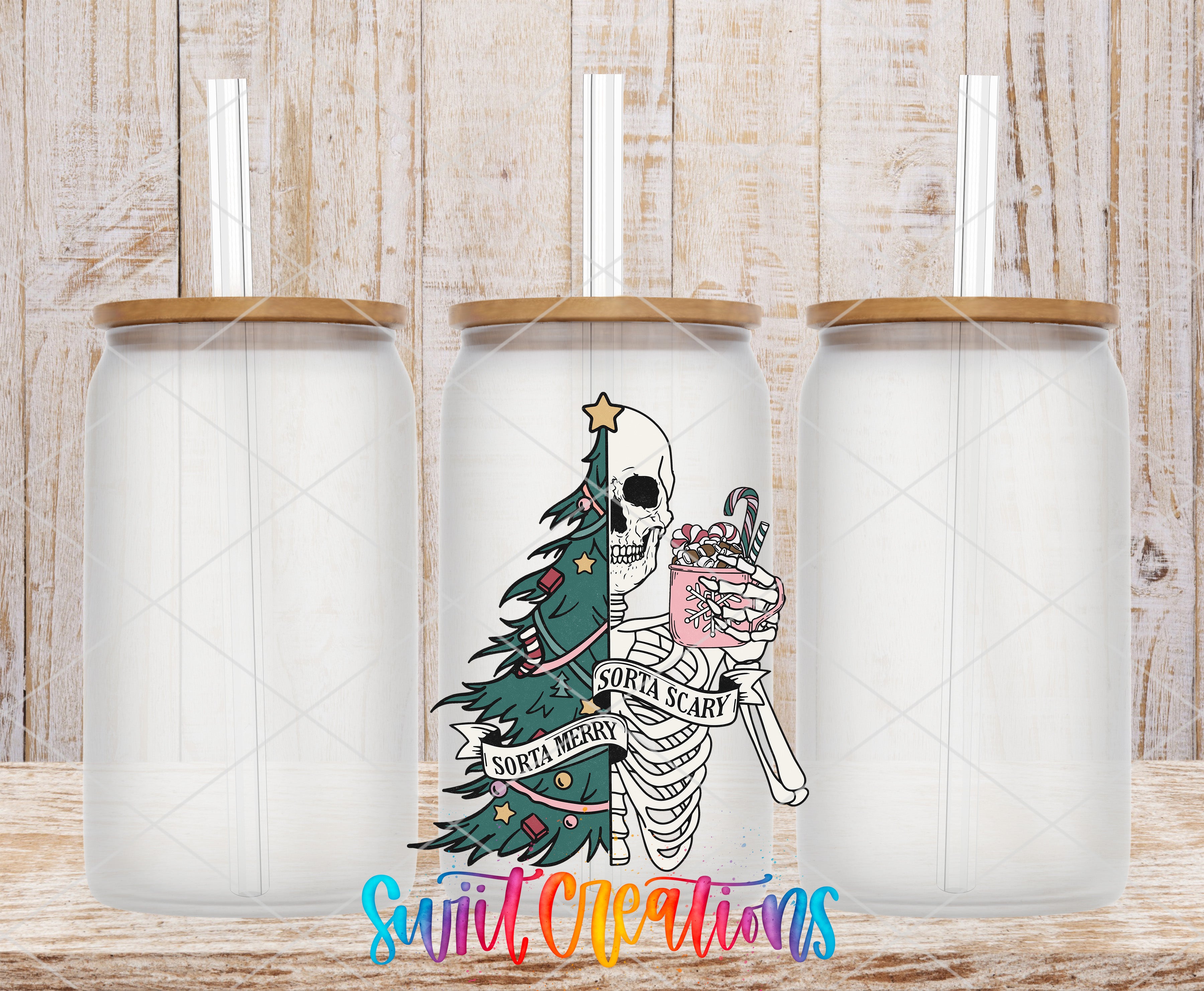 three clear glass tumblers with a unique design on them. The design includes a skeleton holding a Christmas tree and the words "SORTA SCARLET" written on the tumbler.