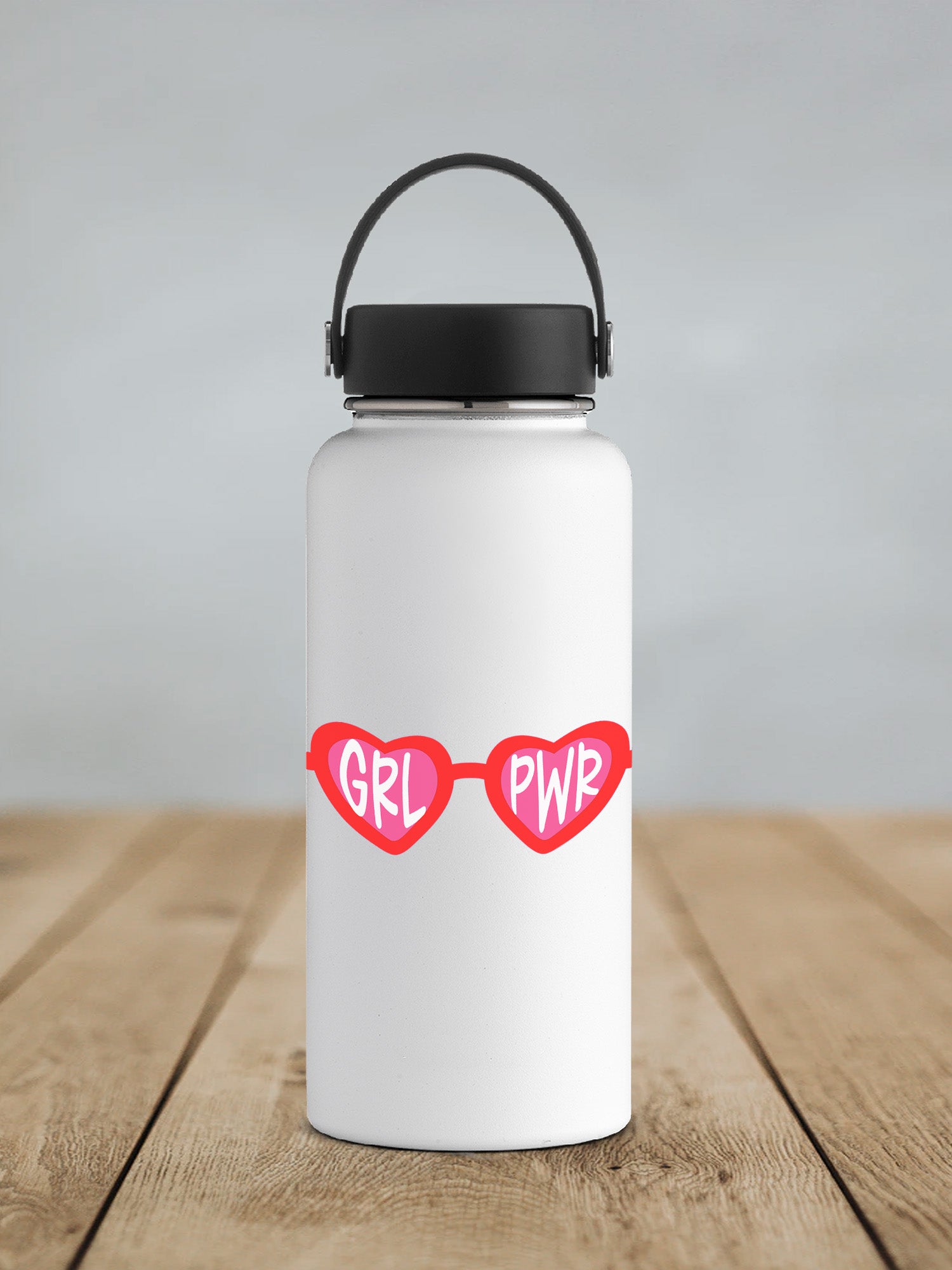 a white water bottle with a pair of heart shaped glasses on it
