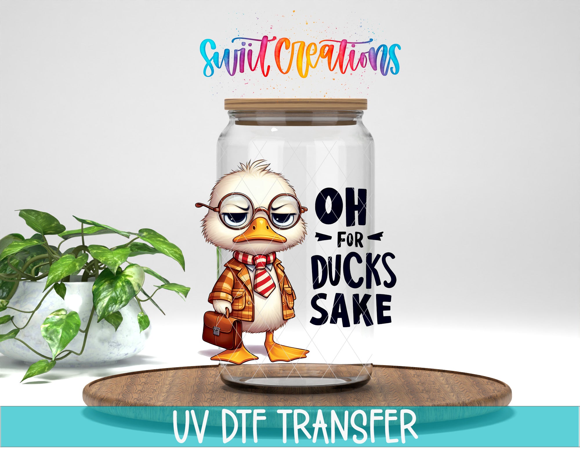 A cartoon duck wearing glasses and a scarf is standing inside a glass jar with the text "OH FOR DUCKS SAKE" printed on it. The jar is placed on a wooden surface, and there is a potted plant in the background.