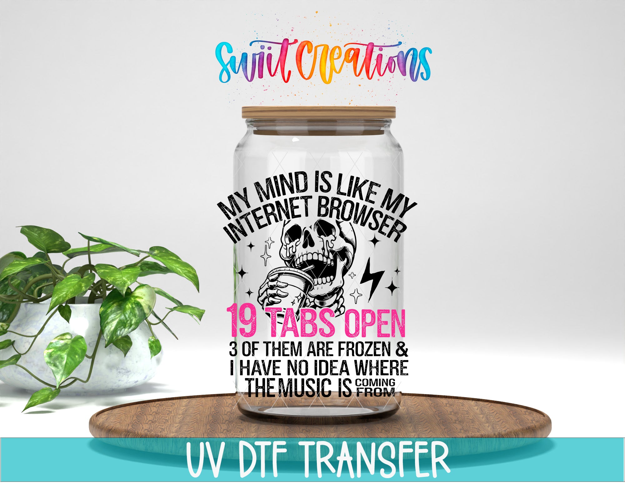 a glass jar with a label that reads "My mind is like my internet browser", accompanied by a skull and lightning bolt design. The jar is placed on a wooden tray, and there is a potted plant in the background.