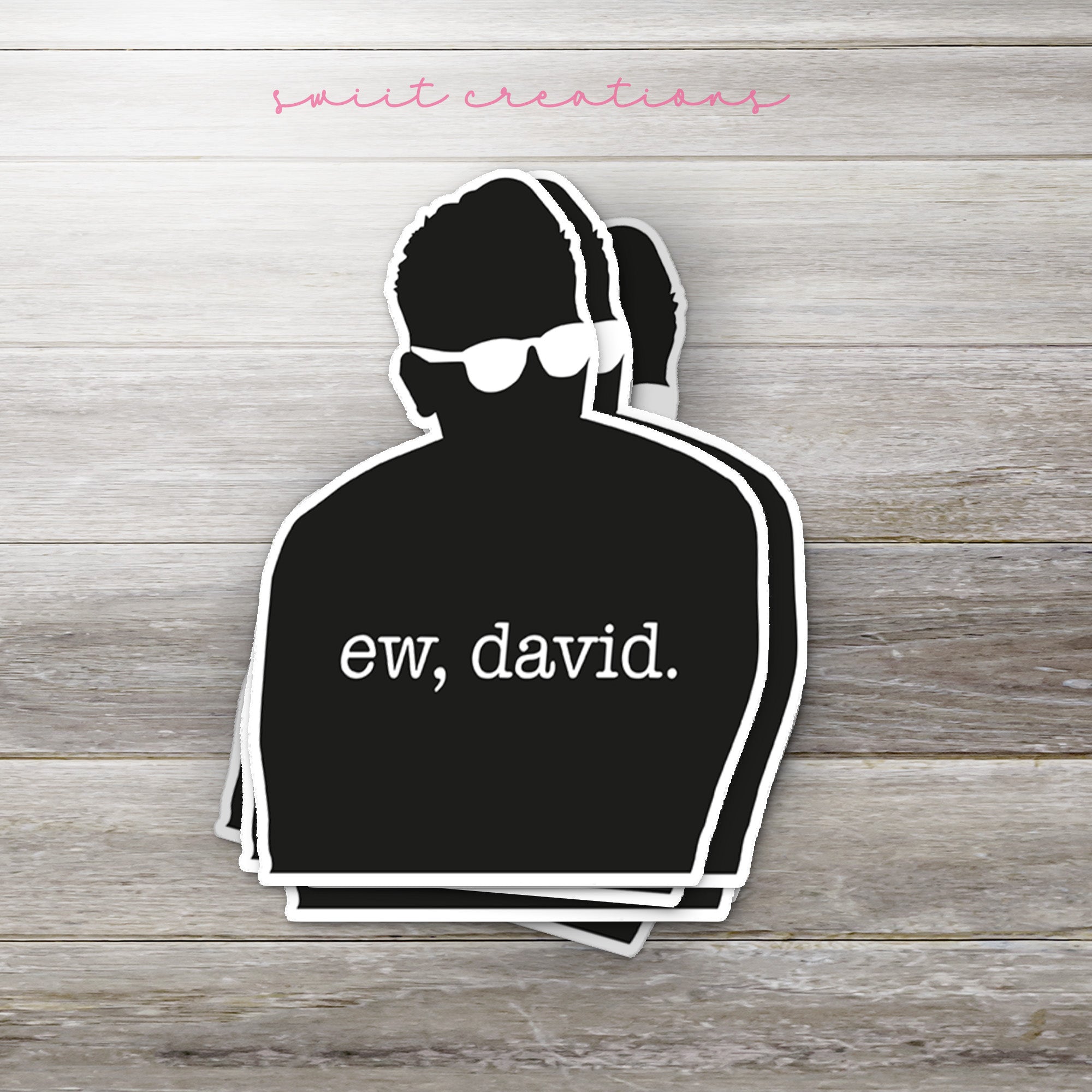 a sticker of a man with sunglasses on his head