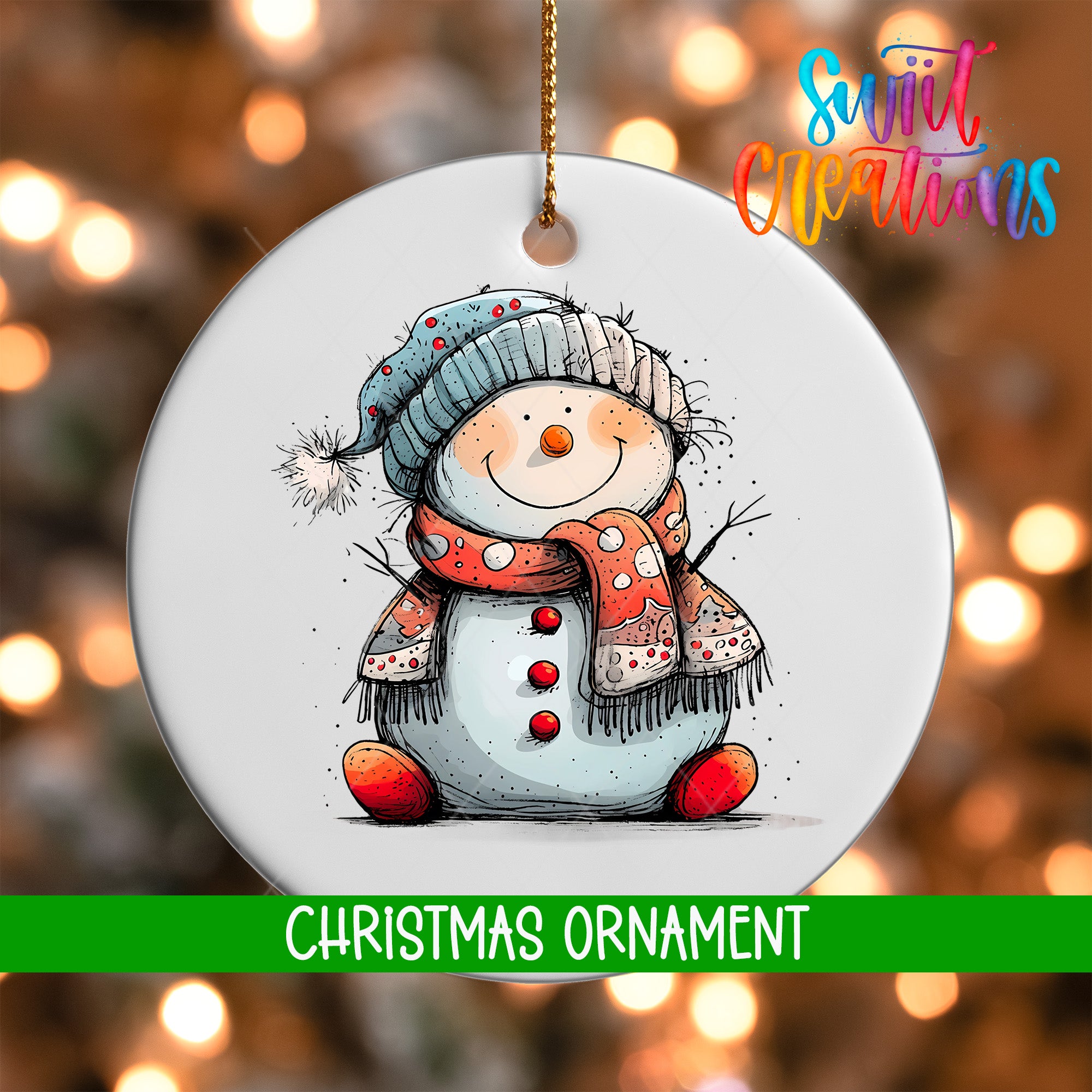 A white Christmas ornament featuring a smiling snowman wearing a red scarf and hat, with a green banner below that reads "Christmas Ornament".