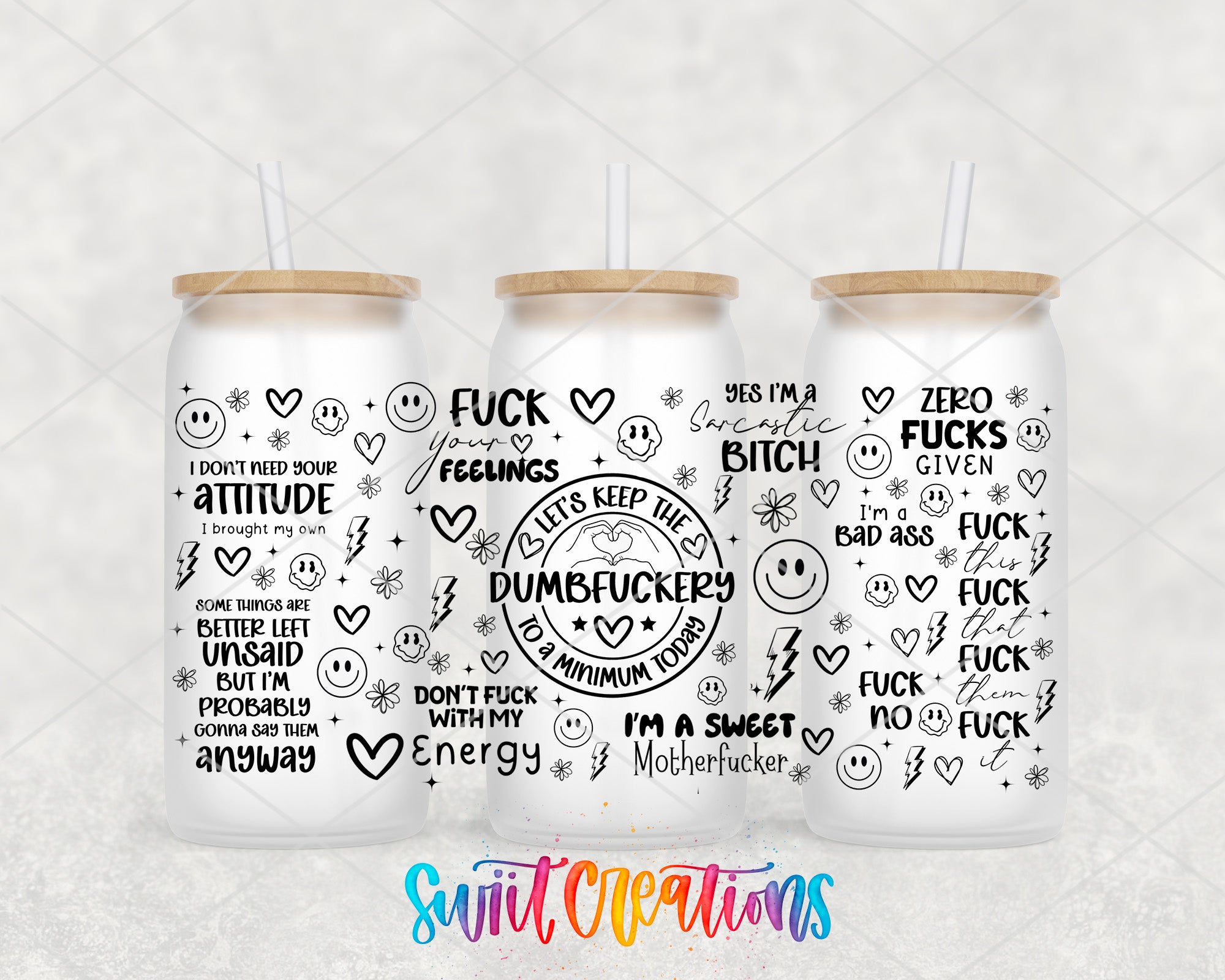 three white tumblers with black text and doodles on them. The text on the tumblers includes various phrases and sayings, such as "I don't need your attitude", "I'm not a bad ass", "zero Fucks given", "dumbFUCKERS", "let's keep the DUMBFUCKERS to a minimum", "I'm a sweet MOTHERFUCKER", and "I'm a SUCKY". The tumblers also have straws attached to the tops.