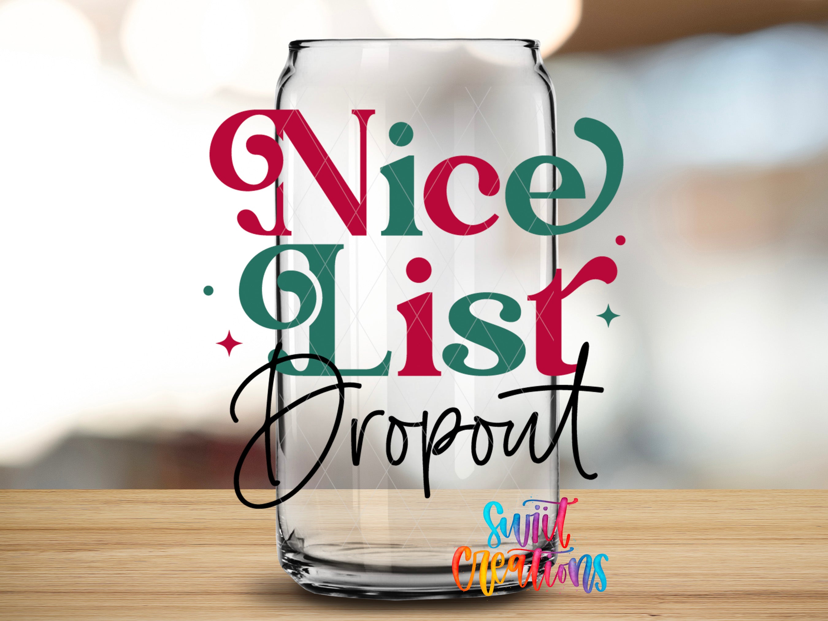 a clear glass jar with the text " Nice List Dropout" written on it in a stylized font.
