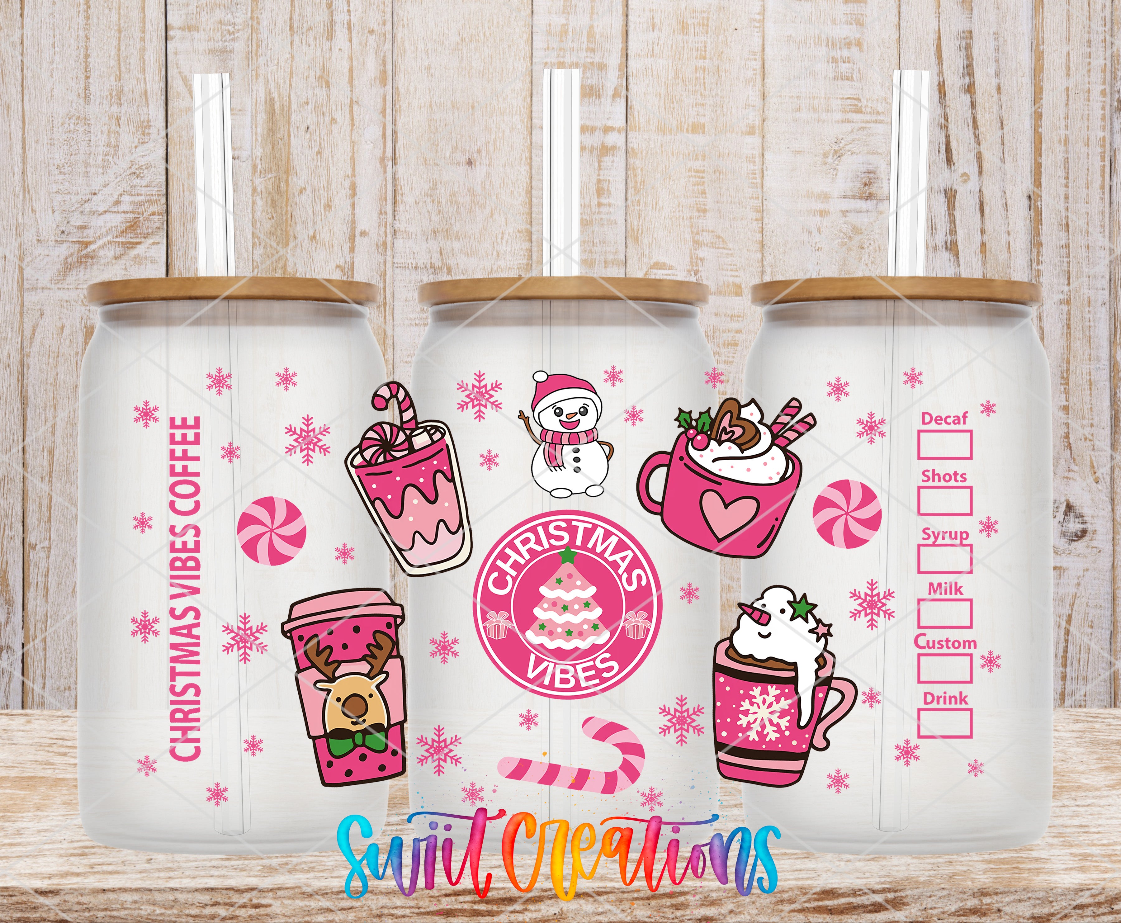 three glass tumblers with a Christmas theme, decorated with various festive elements such as snowflakes, candy canes, and a snowman.
