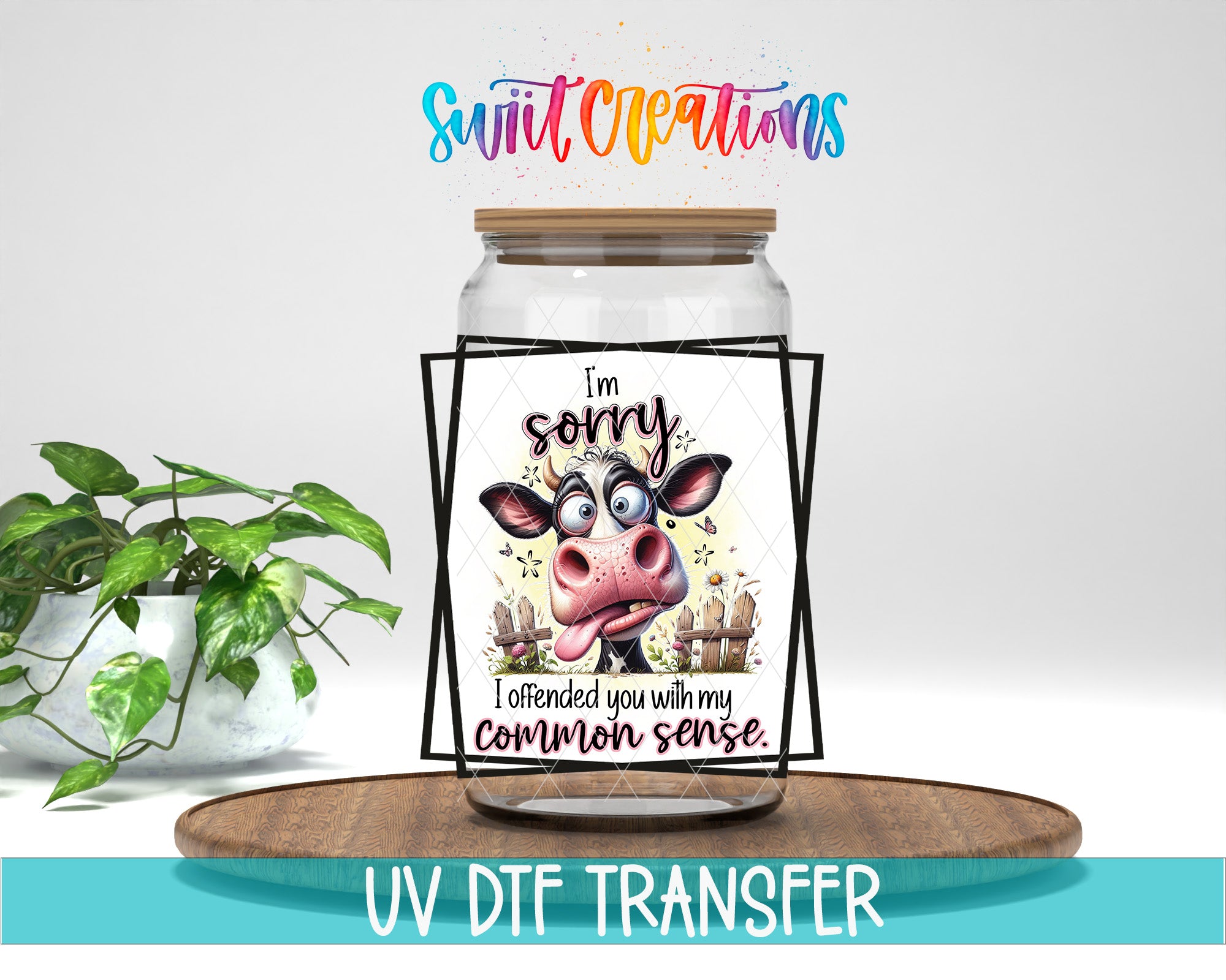 a jar with a cartoon cow on it, along with a sign that says "I'm sorry I attended you with my common sense".