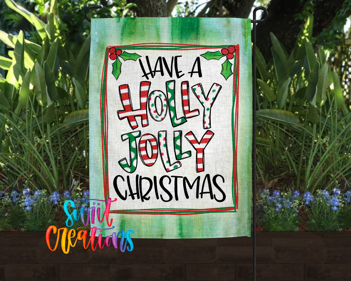 A garden flag with a festive holiday message, featuring the text "Have a Holly Jolly Christmas" in a colorful, decorative font.