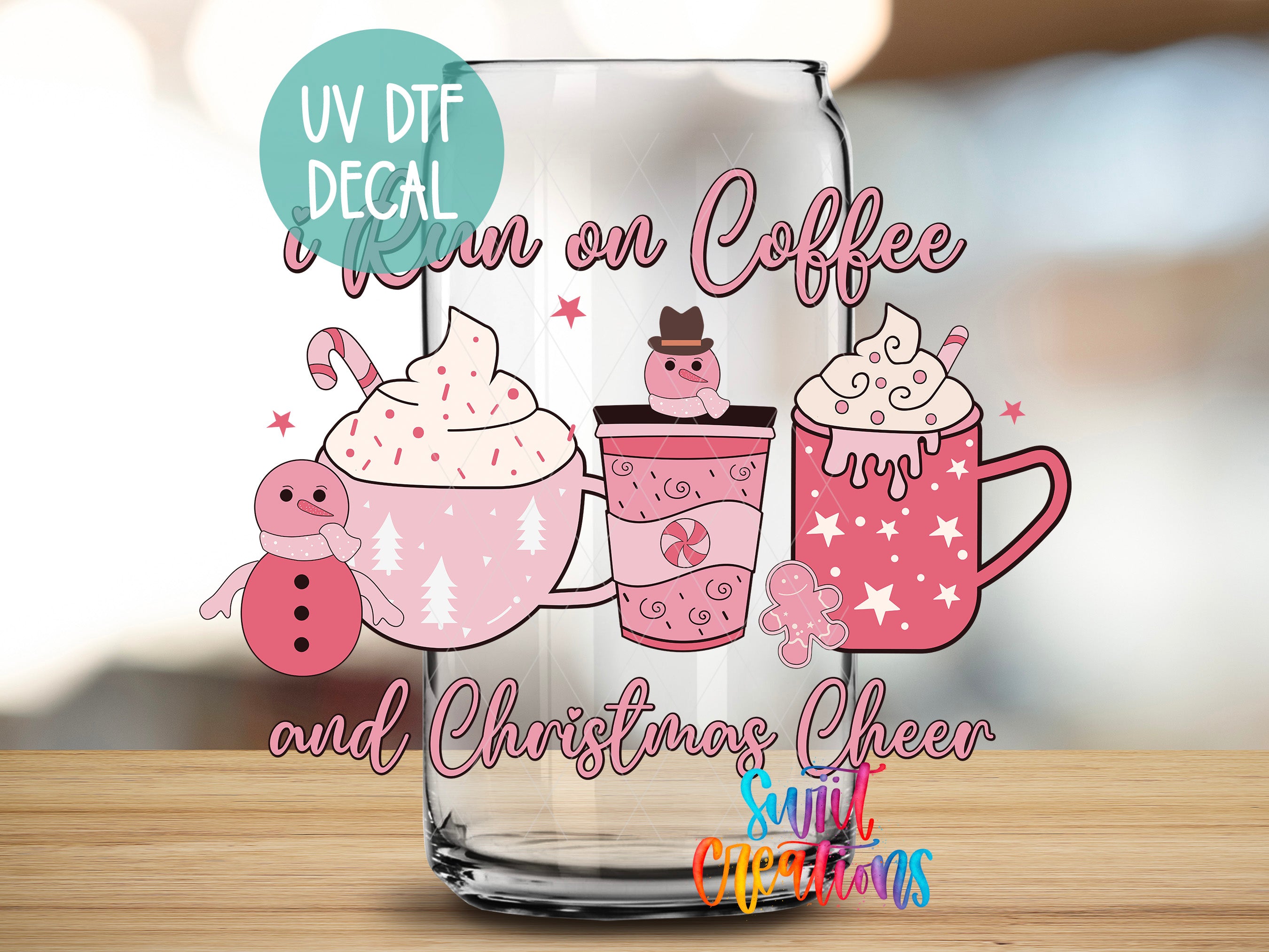 a glass with a picture of coffee and christmas cheer