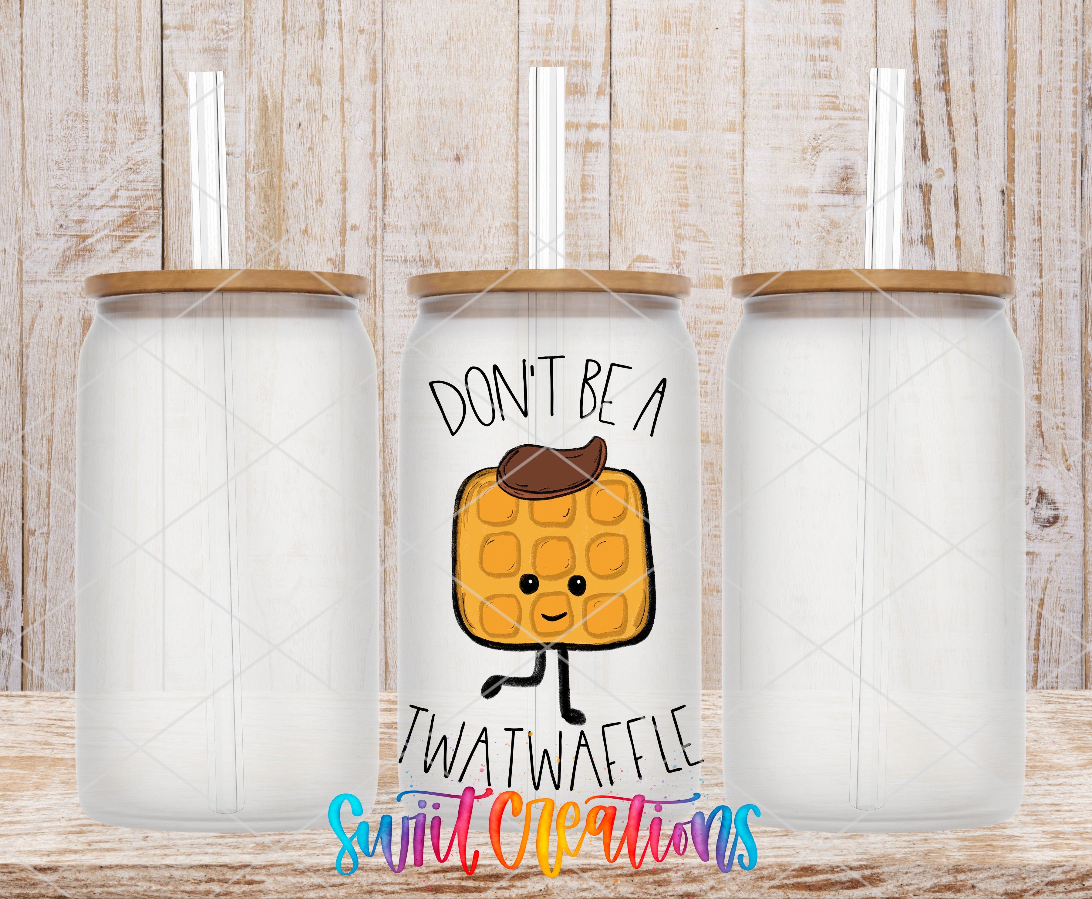 three glass jars with straws, each with a lid and a printed design on the front. The design includes a cartoon waffle character and the text "DON'T BE A TWATWAVEL".
