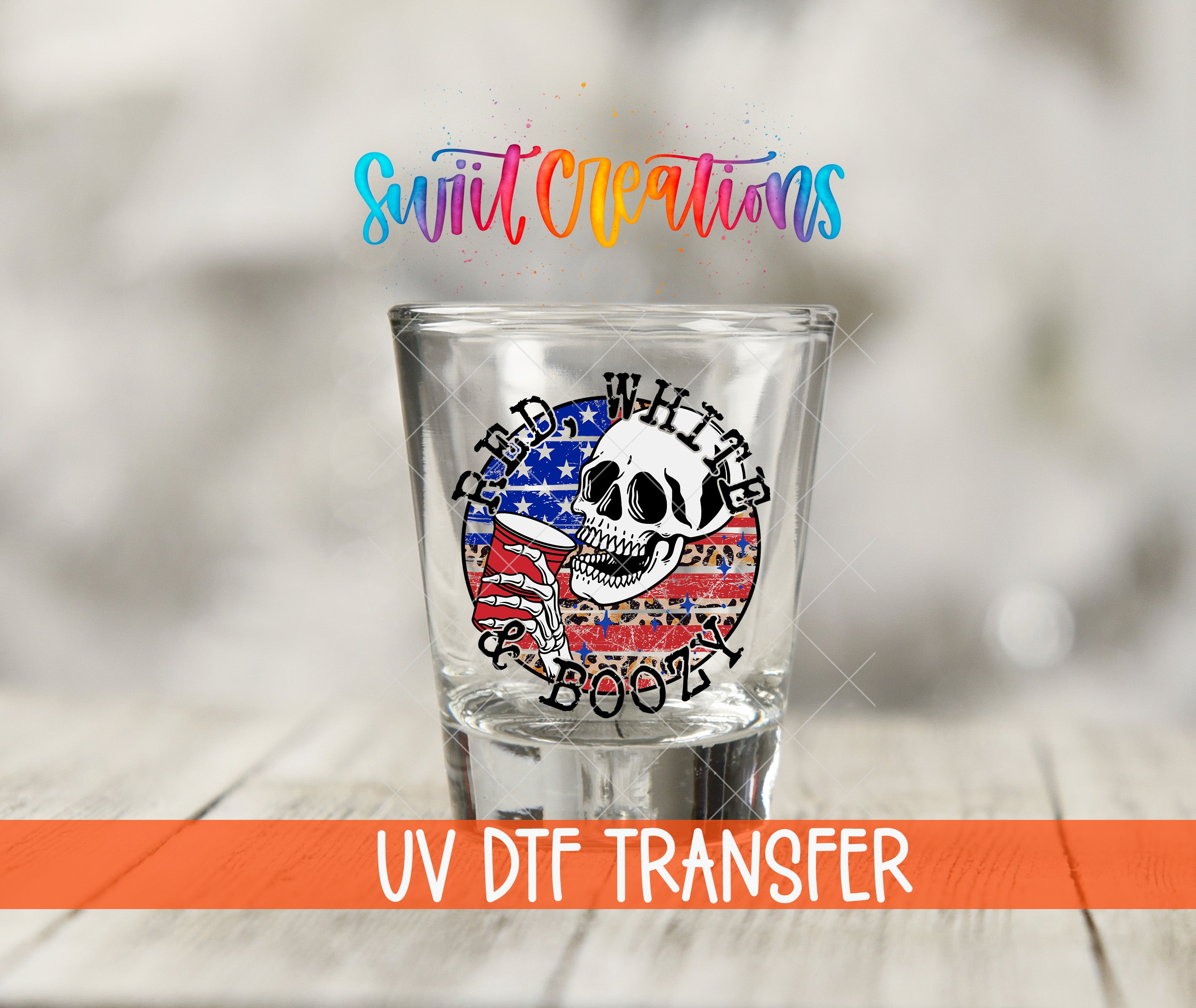 A shot glass with a skull design and the text "Read White Beer" printed on it, along with the text "Swift Creations" and "UV Dtf Transfer" below.