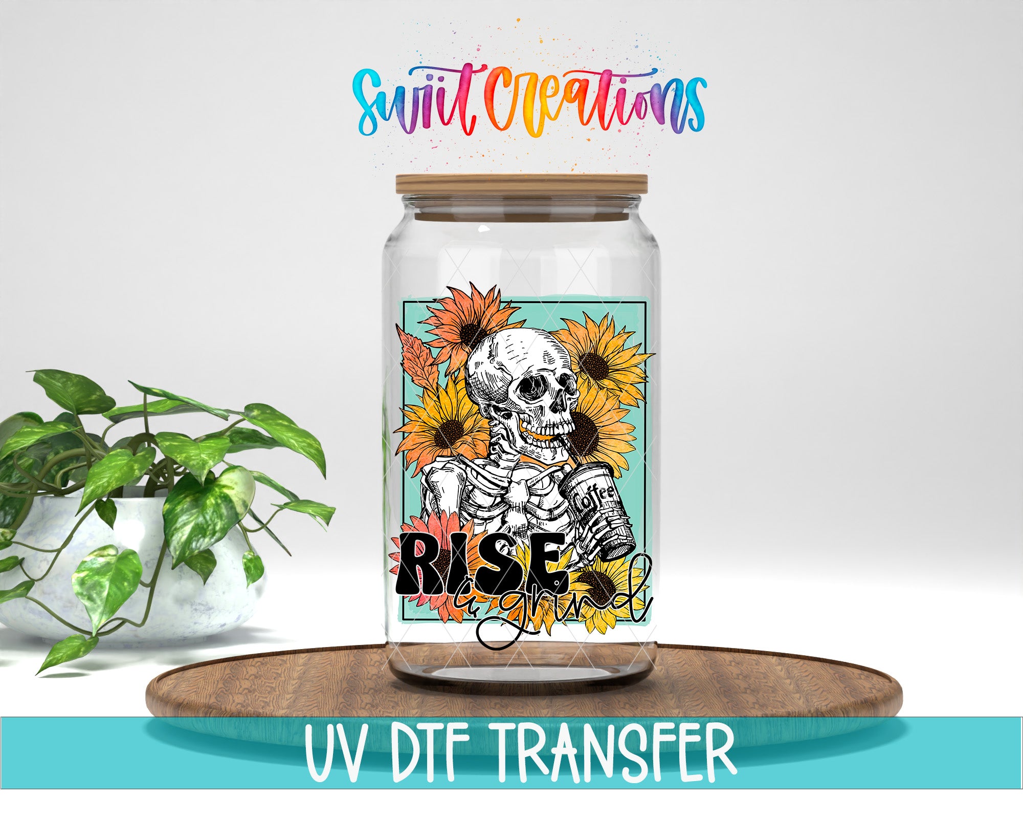 a glass jar with a skull and sunflowers design, placed on a wooden surface.
