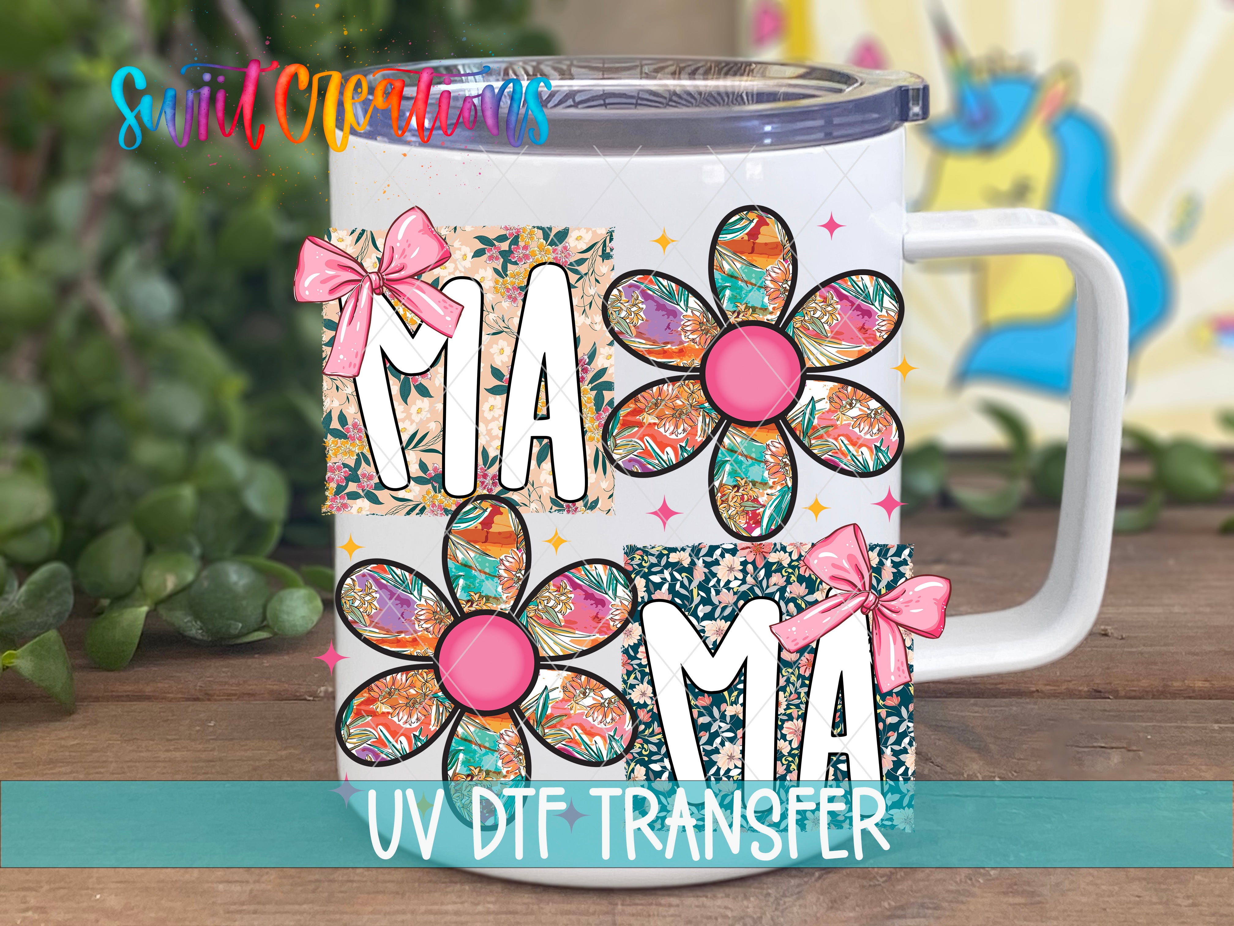 A white mug with colorful floral designs and the text "MAM" printed on it.