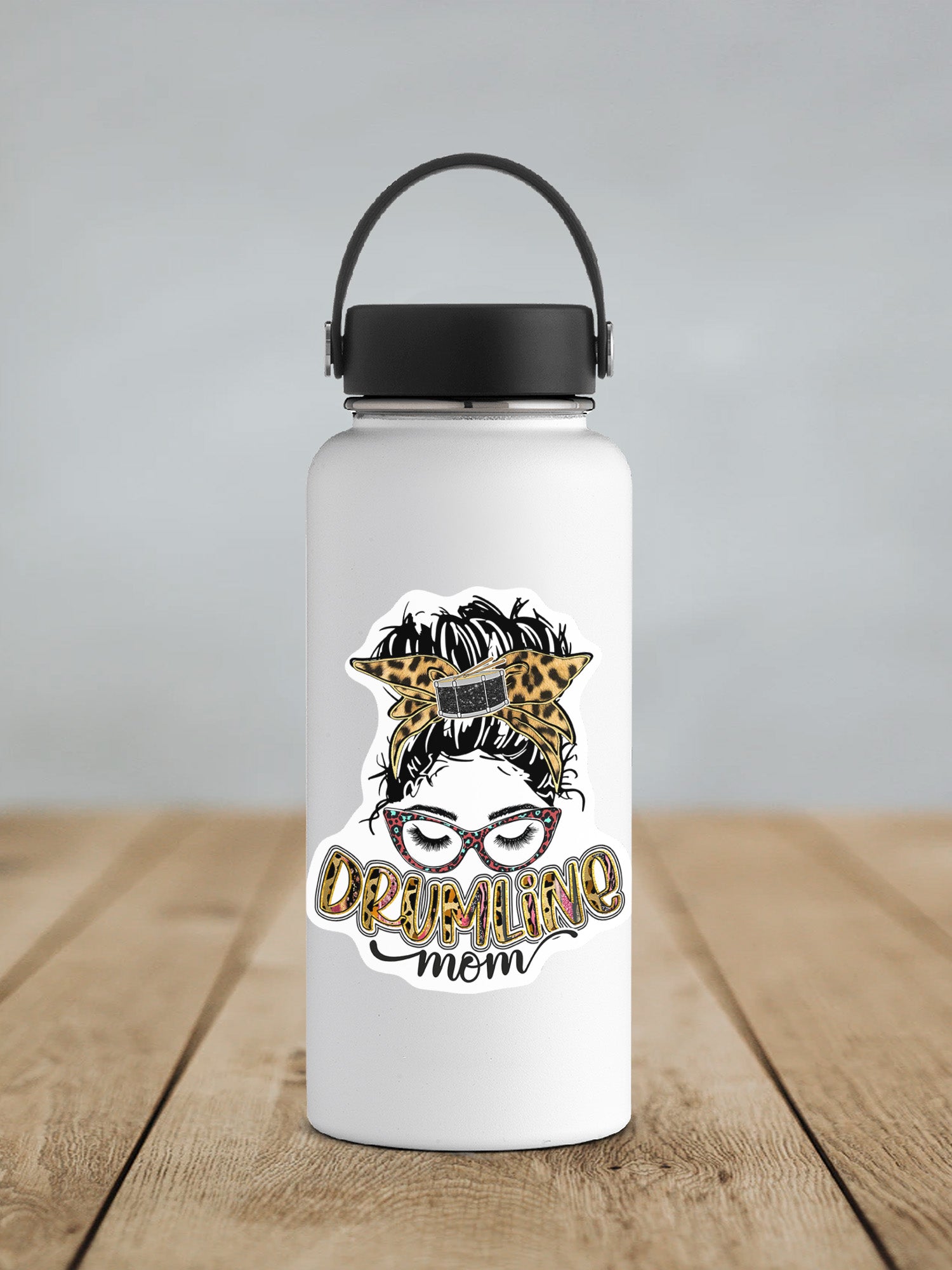 a white water bottle with a woman's face on it