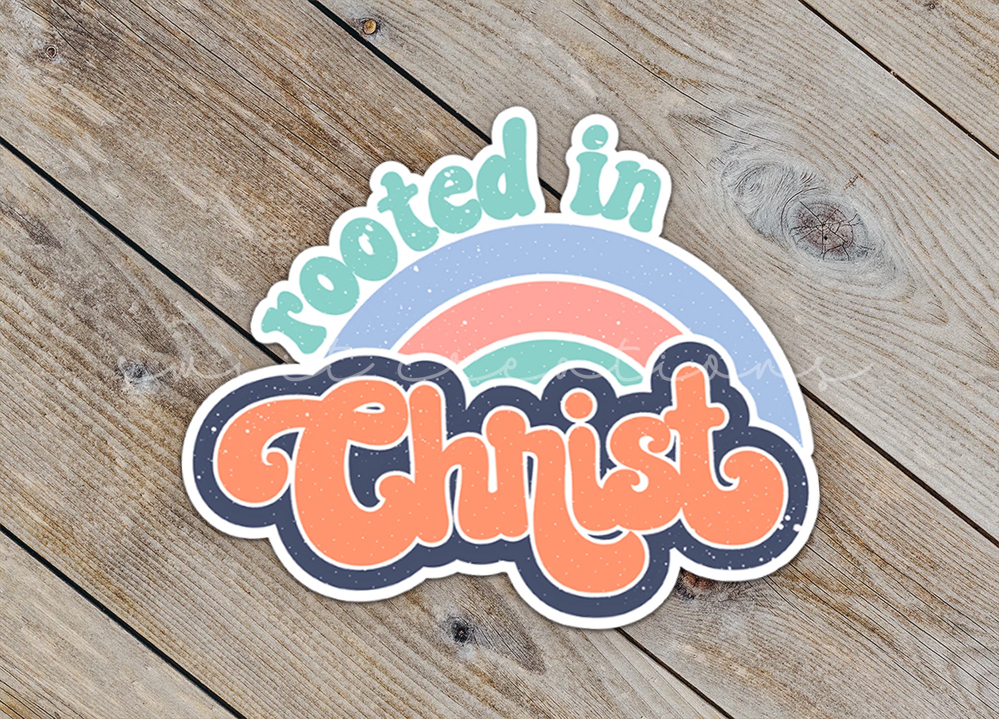 a sticker that says rooted in christ